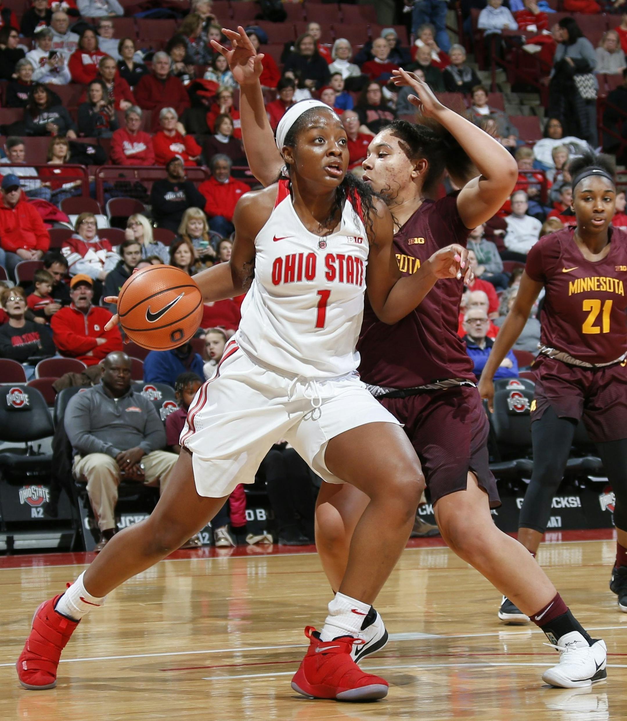 Ohio State forward Stephanie Mavunga (1) works around Minnesota guard/forward Destiny Pitts (3) during the first half of an NCAA college basketball game in Columbus, Ohio, Thursday, Jan. 4, 2018. (Joshua A. Bickel/The Columbus Dispatch via AP)