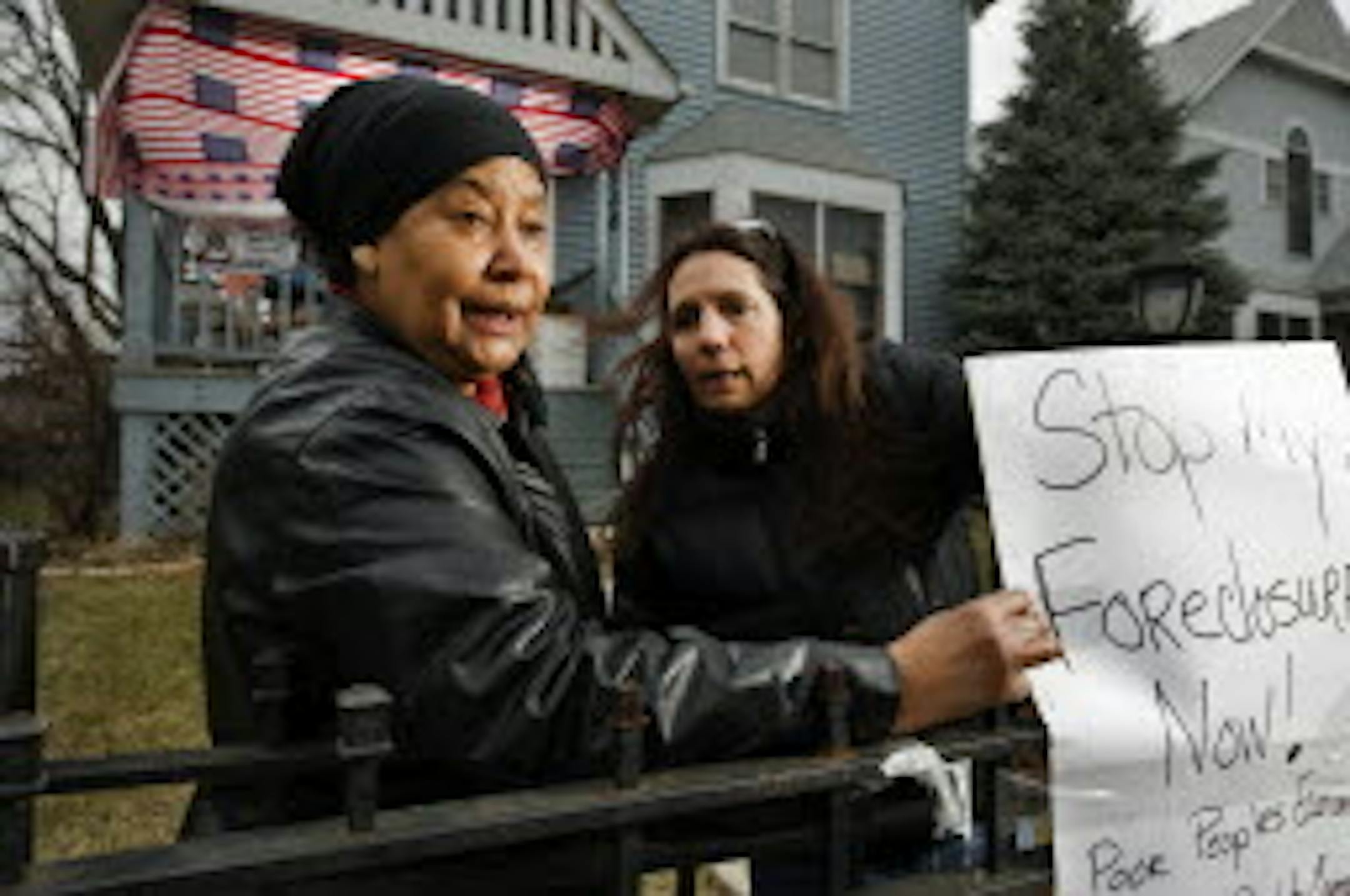 Honkala, right, protests a Minneapolis foreclosure