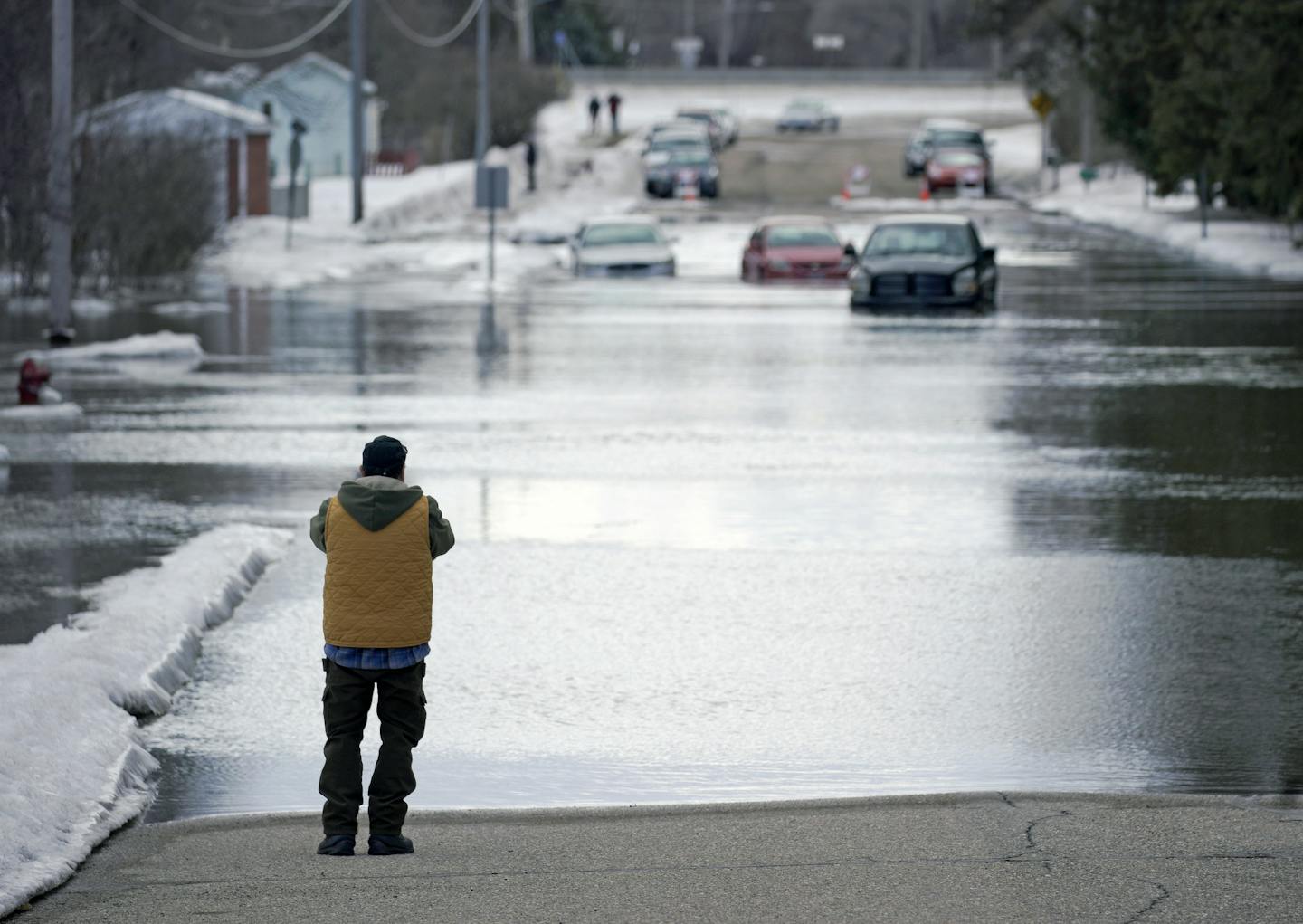 The Sand Creek in Jordan has flooded its banks due to a large ice jam and cut off access to the Valley Green Trailer Park. This was the view of Syndicate Street with a few cars and trucks stranded in the water.