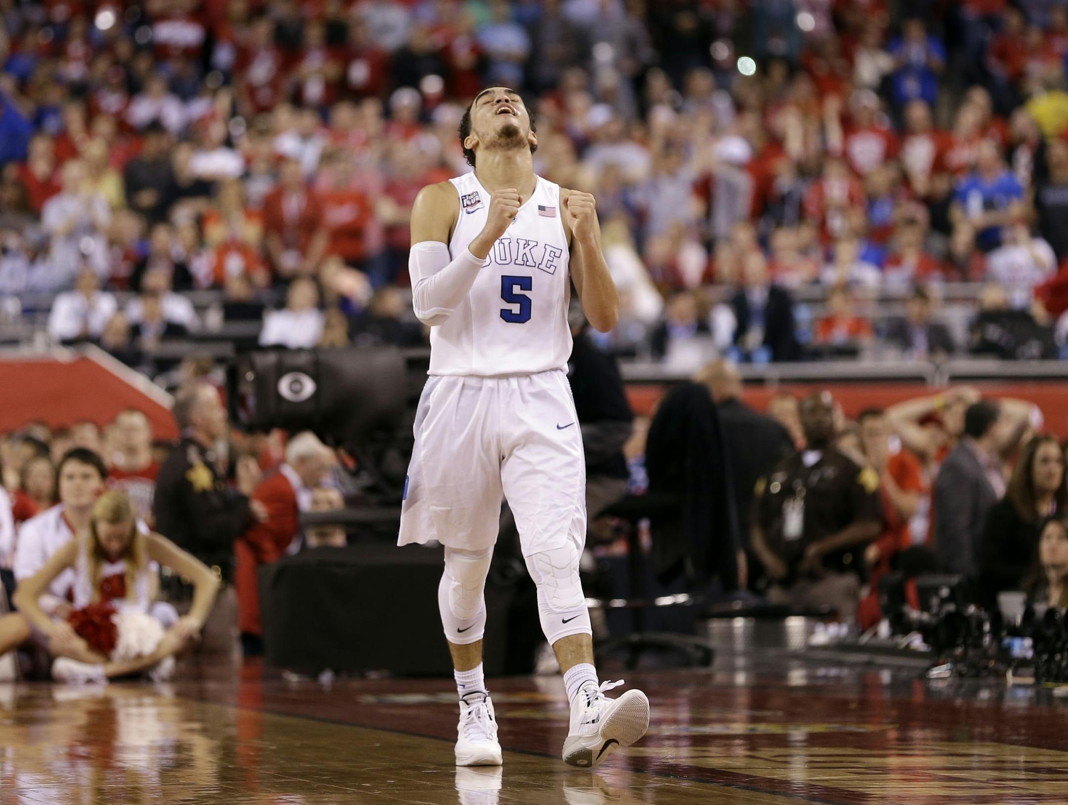 Duke's Tyus Jones reacts during the second half of the NCAA Final Four college basketball tournament championship game against Wisconsin Monday, April 6, 2015, in Indianapolis. Duke won 68-63.