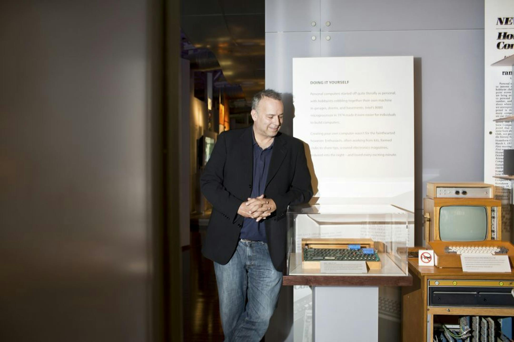 Dag Spicer, a senior curator at the Computer History Museum, next to an Apple-1 on display at the museum in Mountain View, Calif., May 23, 2013. Apple-1 computers, built in Steve Jobs's family garage, have sold for hundreds of thousands of dollars in recent auctions, a run-up reflecting the company's mystique.