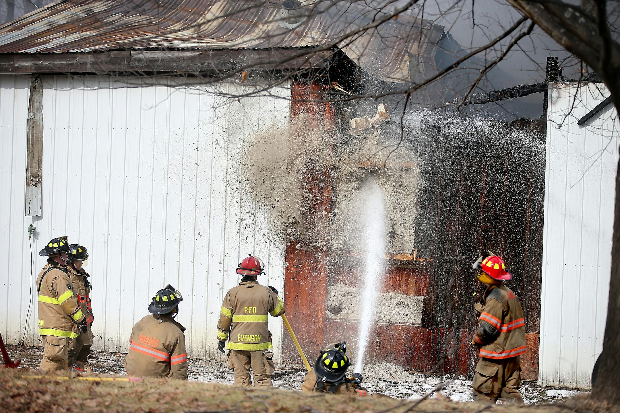 Firefighters from Maple Grove, Corcoran, Hamel, Loretto, and Plymouth, contained a structural fire located in rural Corcoran, MN, Thursday, March 12, 2015.