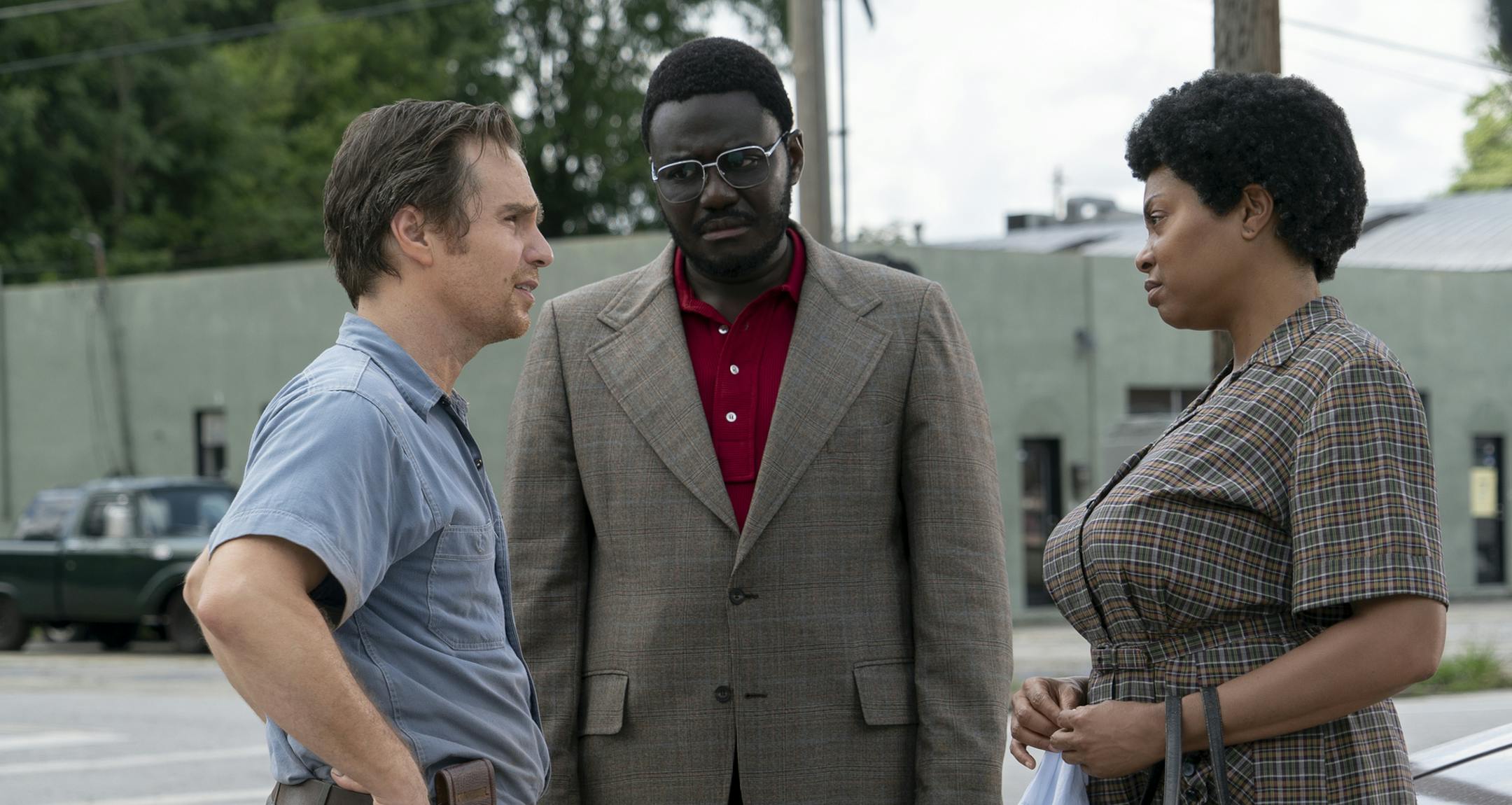 This image released by STXfilms shows, from left, Sam Rockwell, Babou Ceesay and Taraji P. Henson in a scene from "The Best of Enemies." (Annette Brown/STXfilms via AP)