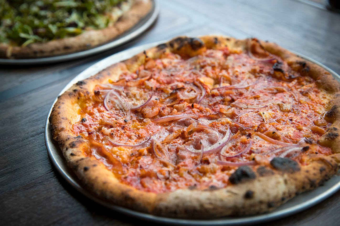 Amatriciana pizza with Italian red sauce, Red Table guanciale and pancetta, pecorino, cream, red onion, chili flake and black pepper. Photographed at Young Joni on Thursday, February 23, 2017, in Minneapolis, Minn.