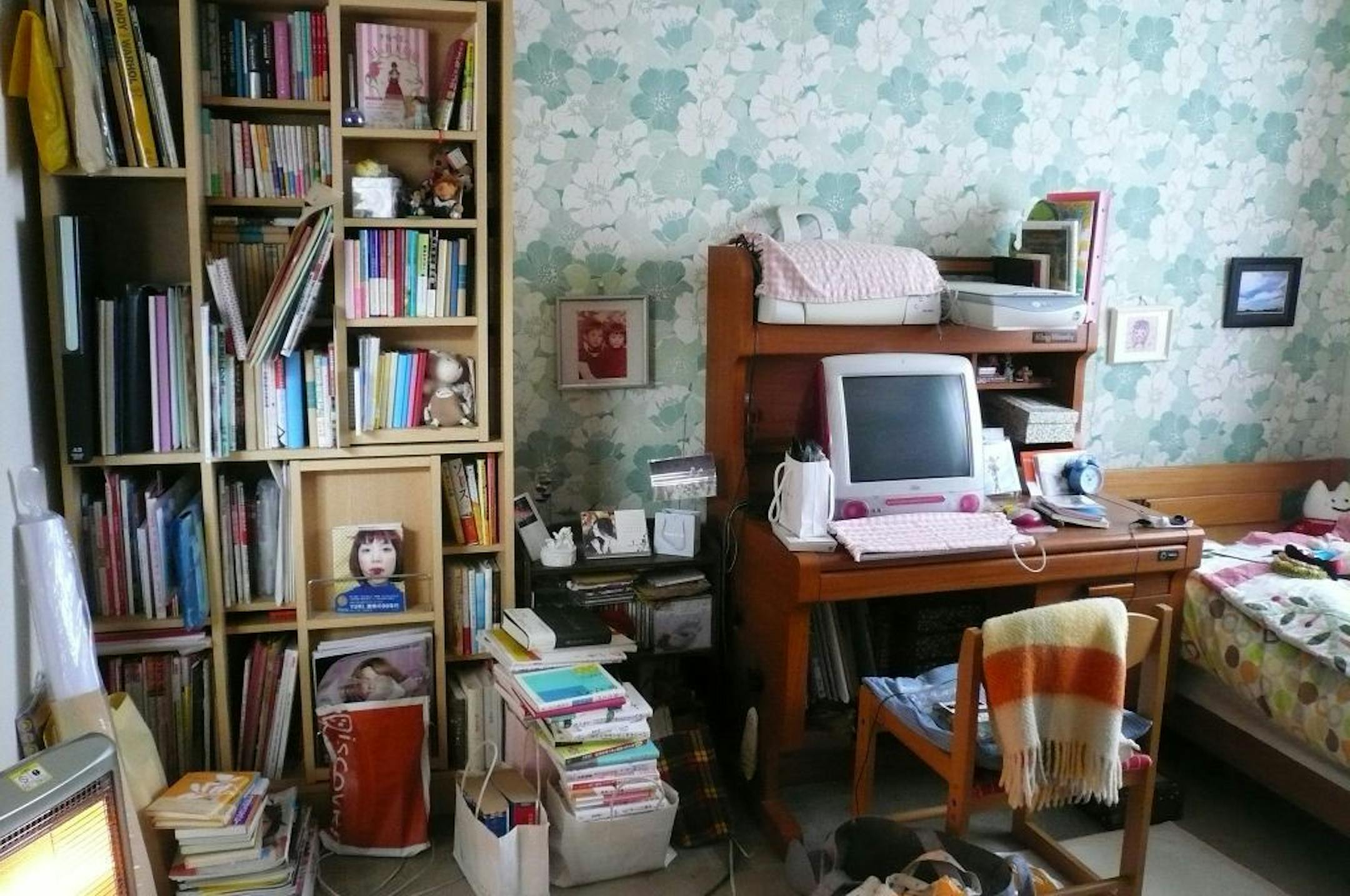 This undated photo provided by Ten Speed Press shows a client's room before it was decluttered by Marie Kondo in Japan. Kondo is the author of the book "The Life - Changing Magic of Tidying Up," published by Ten Speed Press.
