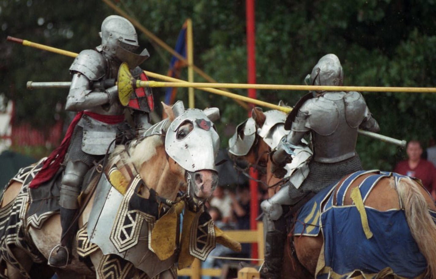 (Left to right) Sir Michael (also known as Michael Banister) of Albuquerque, New Mexico, cq., misses Sir Matthew (also known as Matt Achemire) of Norman, Oklahoma, cq., during a jousting match at the Renaissance Festival in Shakopee, Saturday, August 18, 2001. Sir Michael was the bad knight and Sir Matt was the good knight. Sir Michael won the match.