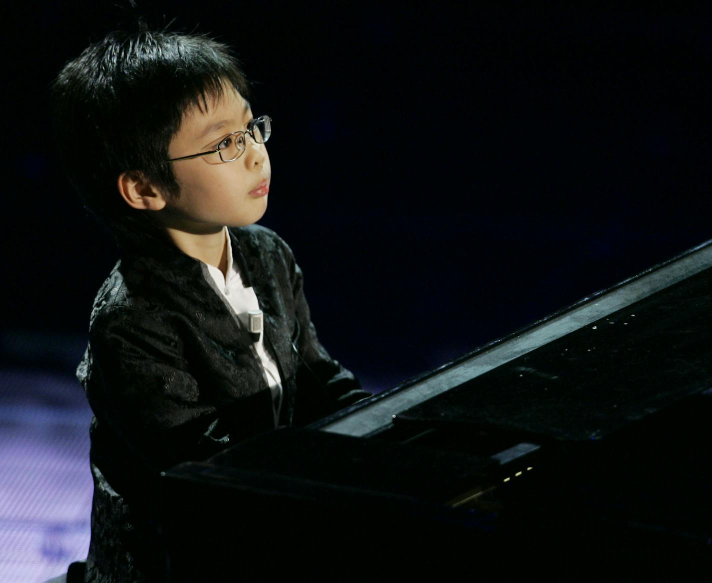 Piano/cello prodigy Marc Yu, at age 9, performed during a song contest in San Remo, Italy, in 2008. Antonio Calanni • Associated Press