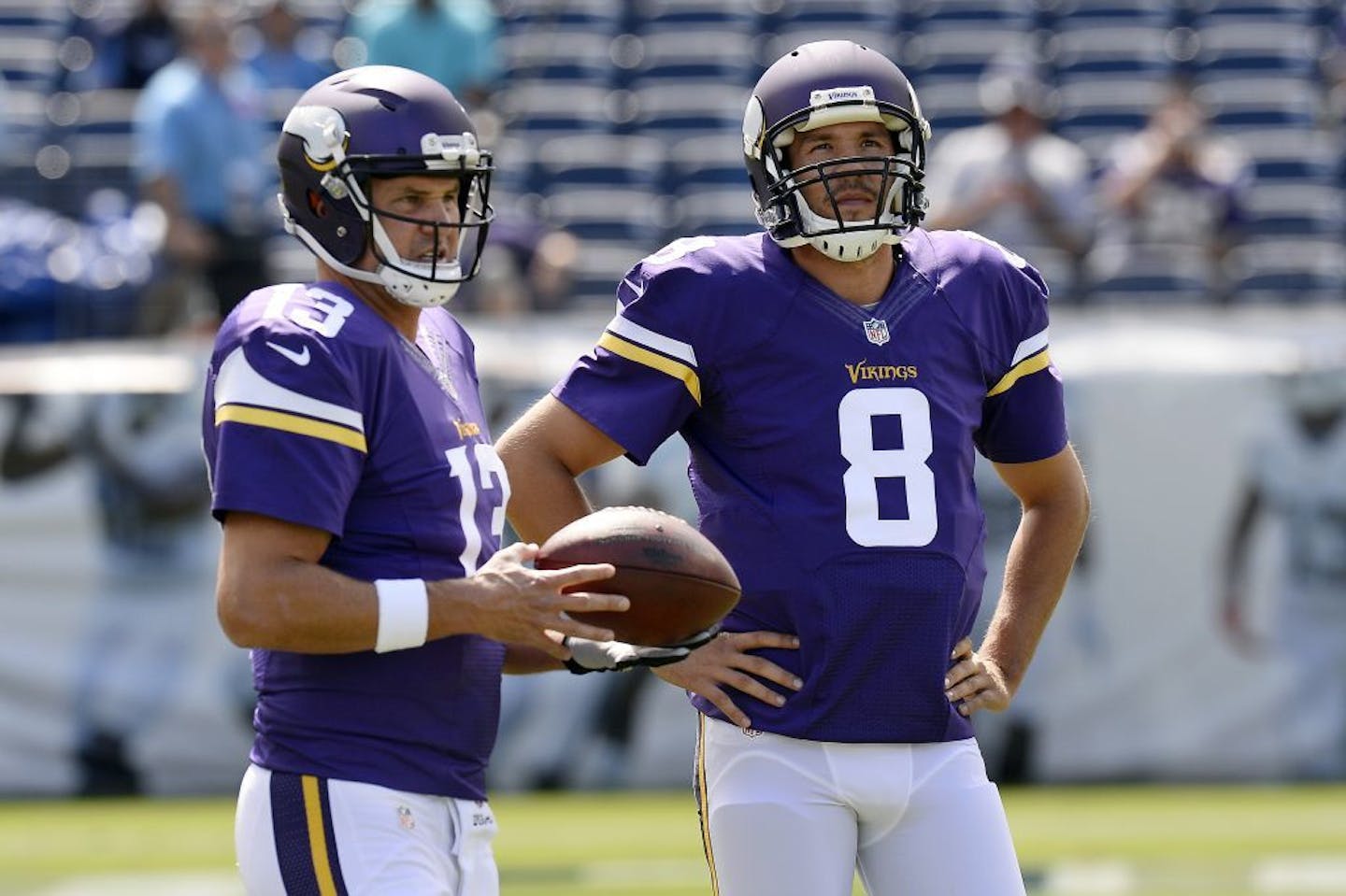 Minnesota Vikings quarterbacks Shaun Hill (13) and Sam Bradford (8) warm up before an NFL football game against the Tennessee Titans Sunday, Sept. 11, 2016, in Nashville, Tenn.