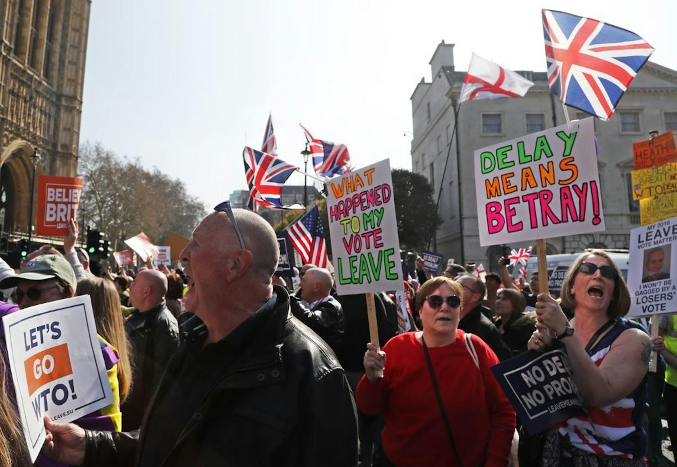 Brexit supporters shout slogans at Parliament Square in Westminster, London, Friday, March 29, 2019. Pro-Brexit demonstrators were gathering in central London on the day that Britain was originally scheduled to leave the European Union. British lawmakers will vote Friday on what Prime Minister Theresa May's government described as the "last chance to vote for Brexit."