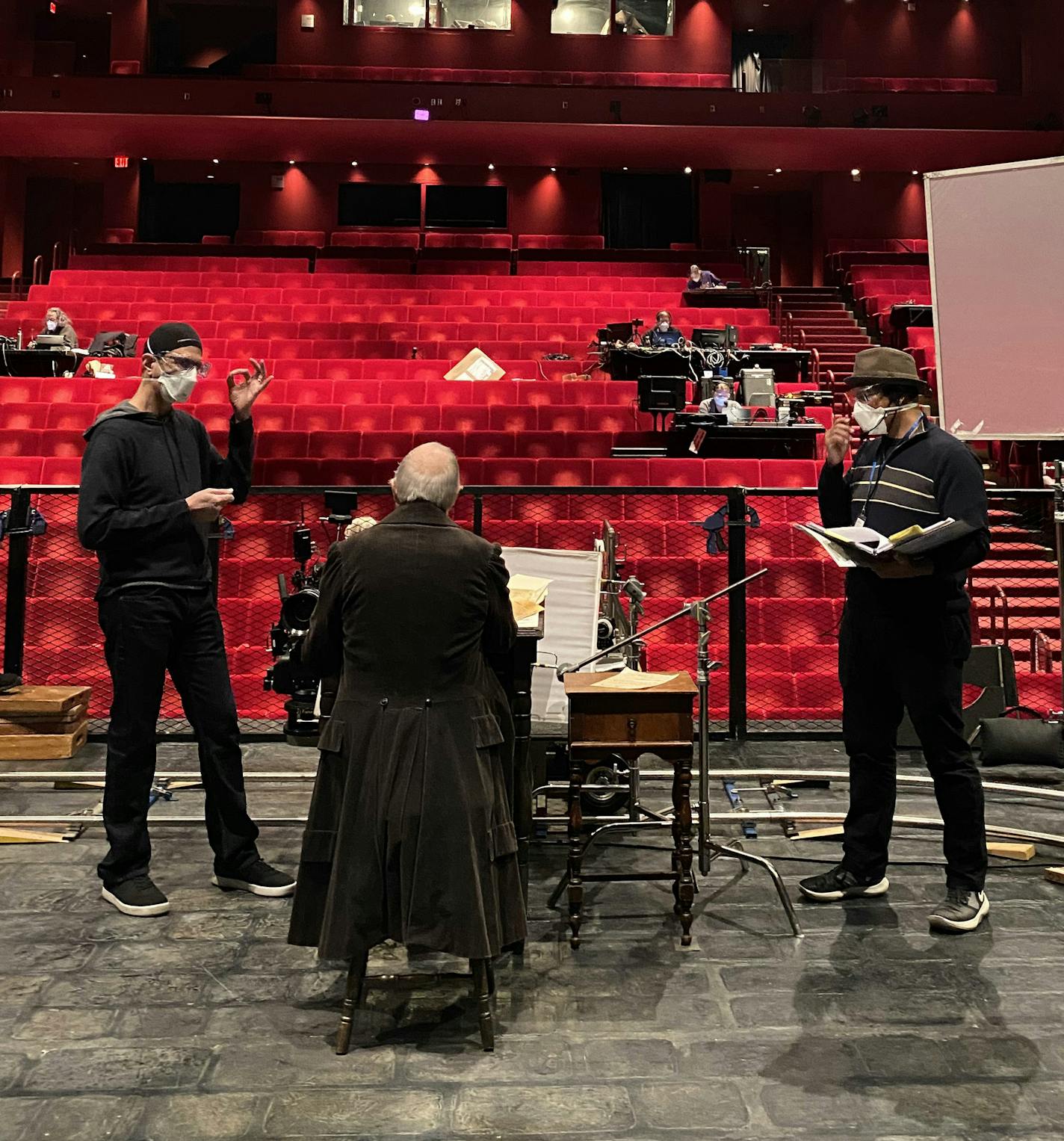 Filming "A Christmas Carol" for the Guthrie Theater's 2020 production. left to right, on set in the McGuire Proscenium: Joseph Haj, Nathaniel Fuller, and E.G. Bailey. Photo: Kaitlin Schlick