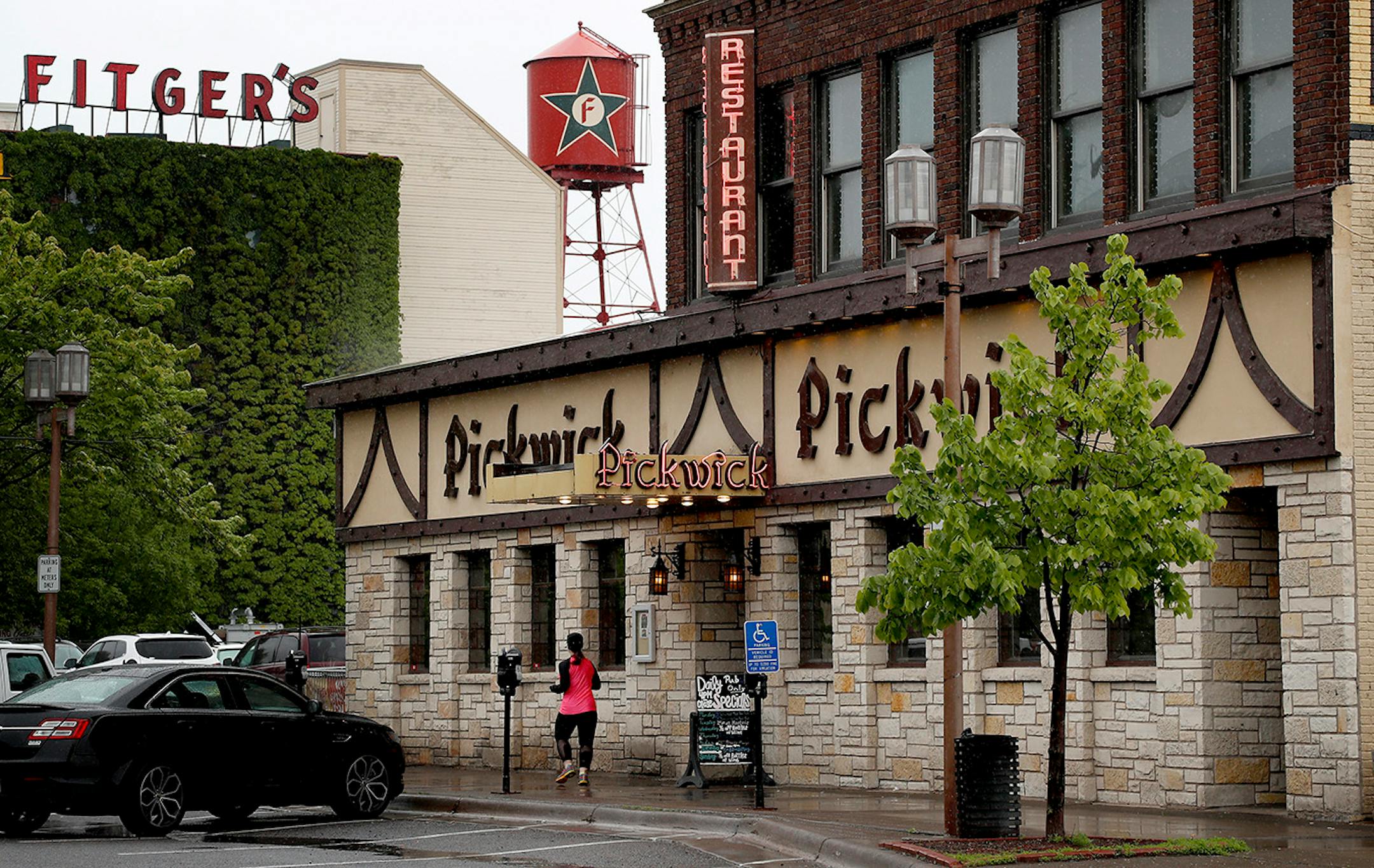 A runner made her way past Pickwick Restaurant & Pub and Fitger's Inn.