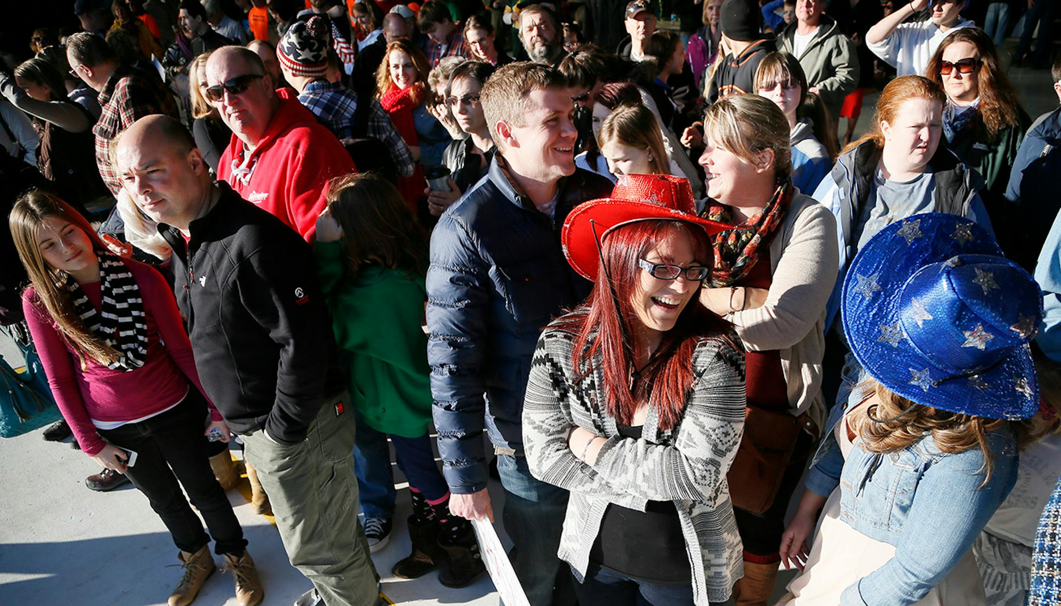 Families gather for the arrival of the more than 100 Airmen and three C-130 H3 Hercules aircraft from the 934th Airlift Wing, Air Force Reserve, return from their deployment to Southwest Asia after their four-month tour of duty. Sunday January 18, 2015 Minneapolis, MN.] Jerry Holt/ Jerry.Holt@Startribune.com