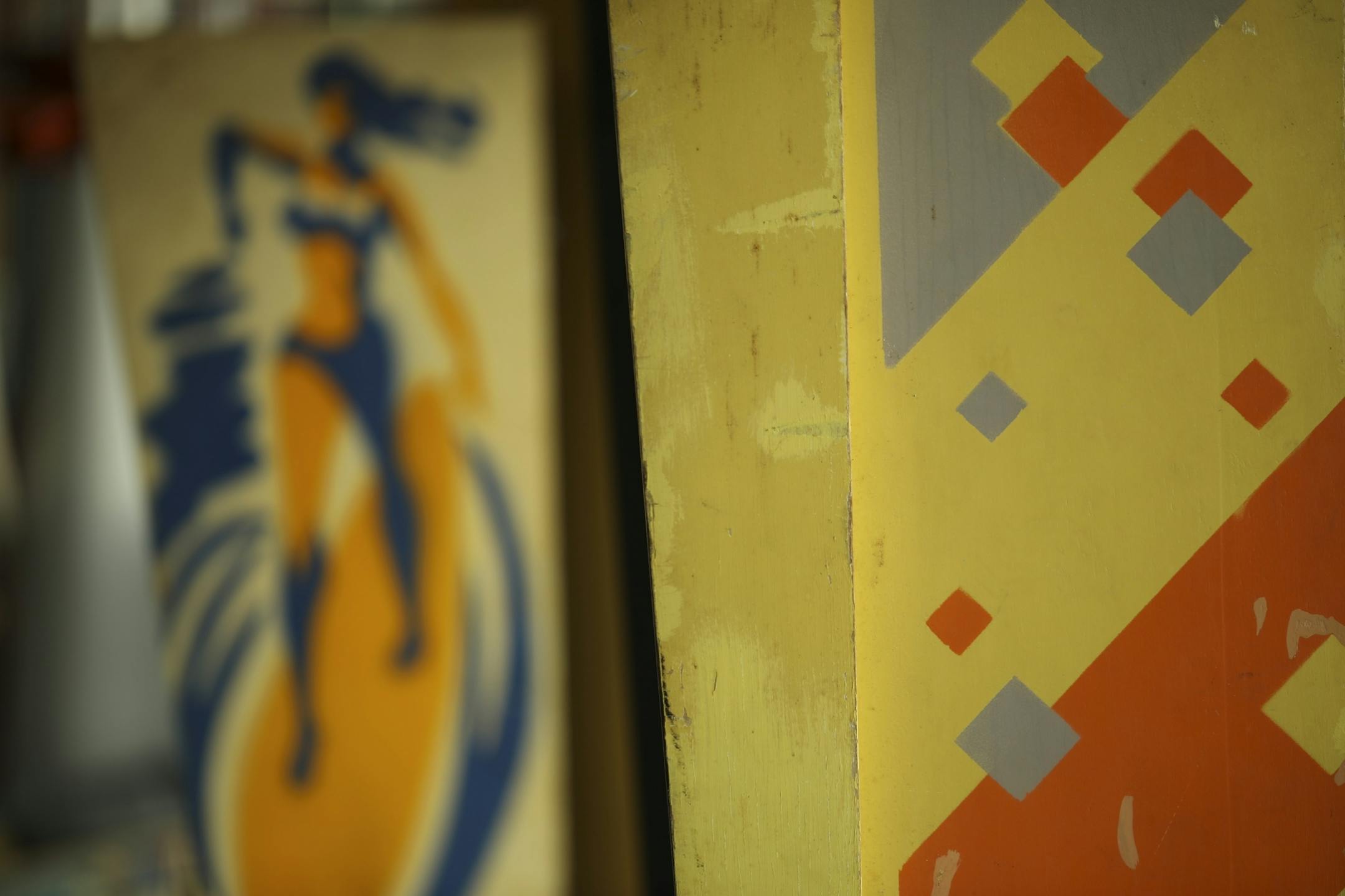 Detail of the pain scheme on a pair of pinball machines.