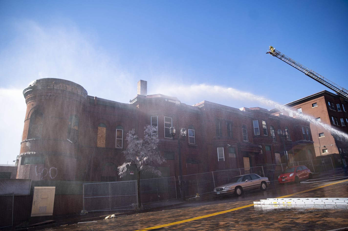 Duluth firefighters worked at putting out a fire at the former Paul Robeson Ballroom and Kozy Bar on Sunday morning. ] ALEX KORMANN • alex.kormann@startribune.com Fire on Sunday has for a second time since May struck the home of the former Paul Robeson Ballroom and Kozy Bar, a downtown Duluth building that is locked in a long-running legal stalemate over its fate.