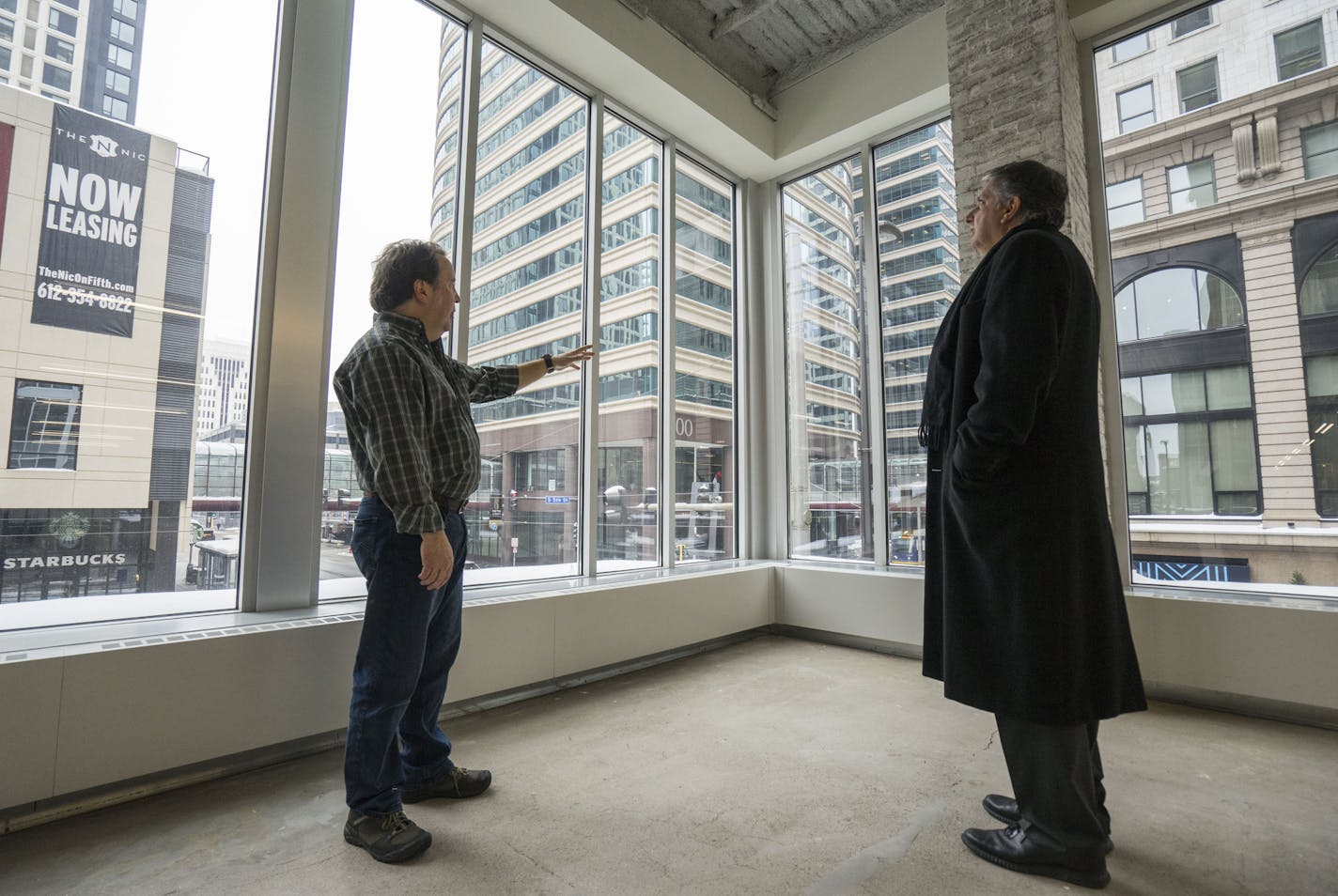 Rhys MacPherson, left, project manager, and Jack Poling, managing partner of MSR Design talk about their new office in Minneapolis on Thursday, Feb. 14 2019. ]
TONY SAUNDERS &#xb0; anthony.saunders@startribune.com This new office will feature 13,587 square feet of usable space.