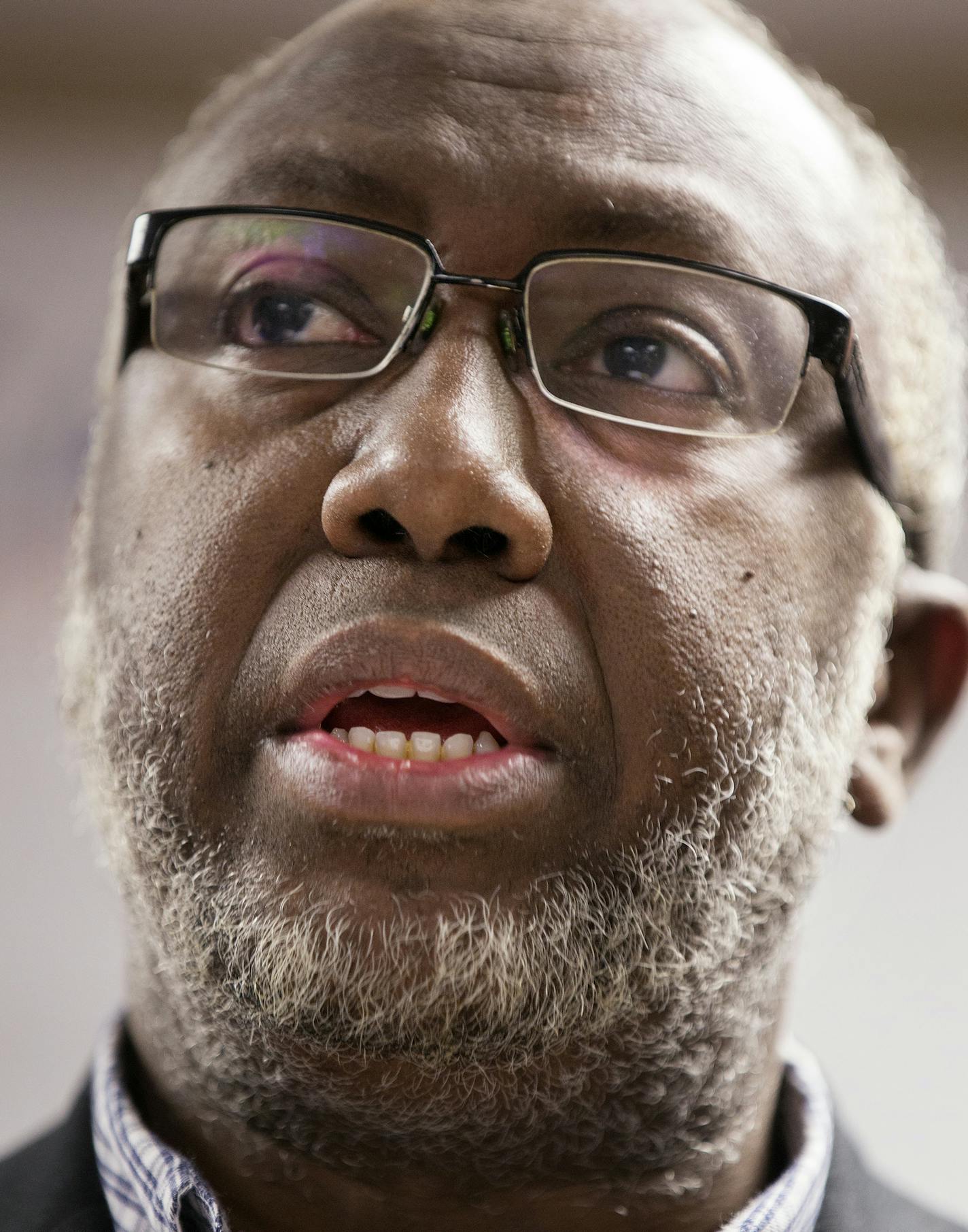 Imam Hassan Mohamud of the Minnesota Da'Wah Institute, along with members of the local Muslim and Somali community, raises concerns about the Department of Justice's new pilot program to counter violent extremism during a press conference on Tuesday, February 17, 2015. ] LEILA NAVIDI leila.navidi@startribune.com /