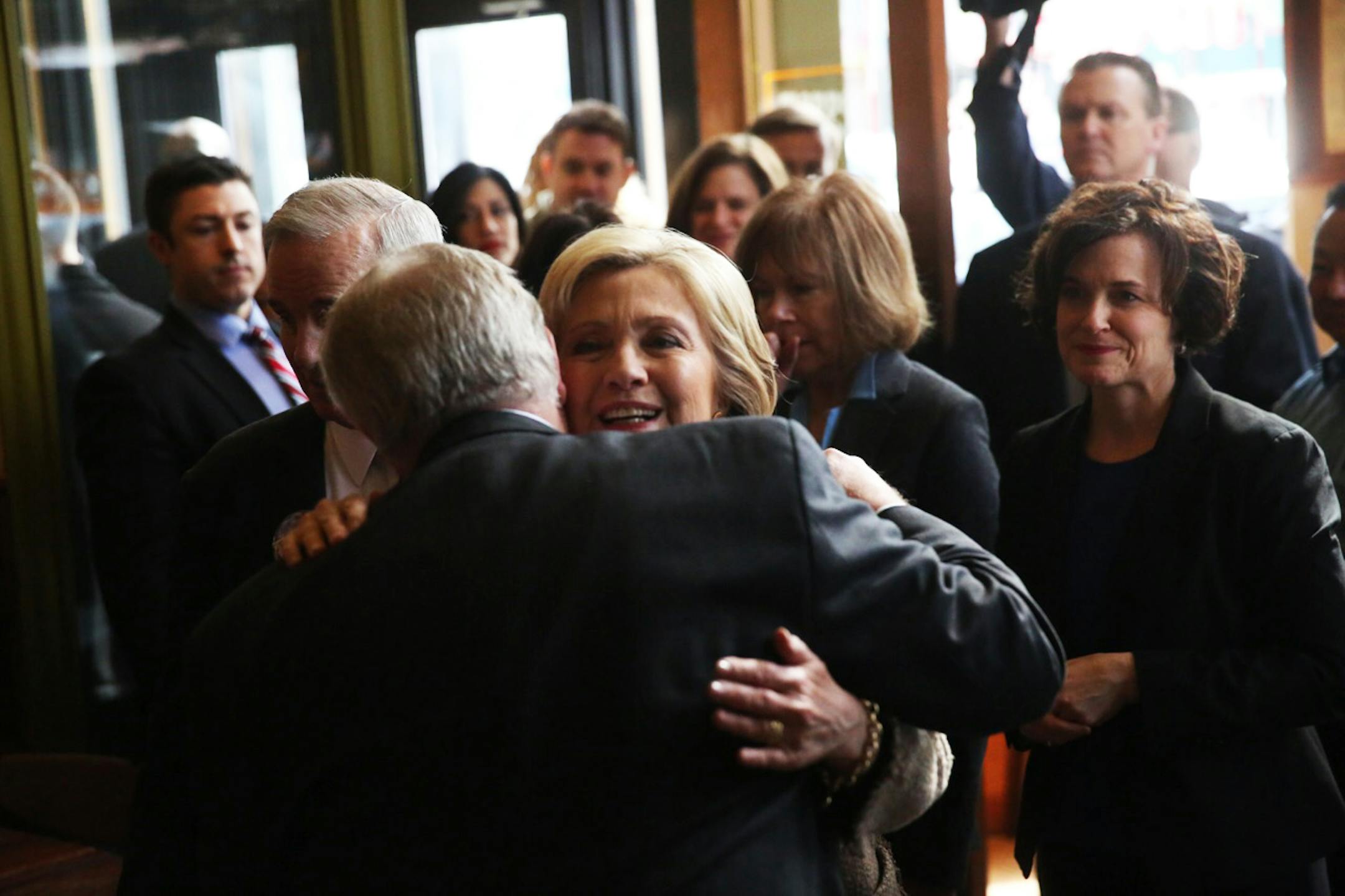 Hillary Clinton greeted supporters at Mapps Coffee Shop in the Cedar-Riverside neighborhood of Minneapolis on her first Twin Cities stop Tuesday.