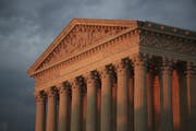 FILE - This Oct. 4, 2018, file photo shows the U.S. Supreme Court at sunset in Washington. More than 200 corporations have signed a friend-of-the-cour