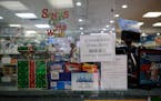 FILE — A sign in a pharmacy in the Park Slope neighborhood of Brooklyn on Thursday morning Dec. 23, 2021, notes that home rapid tests for COVID-19 a