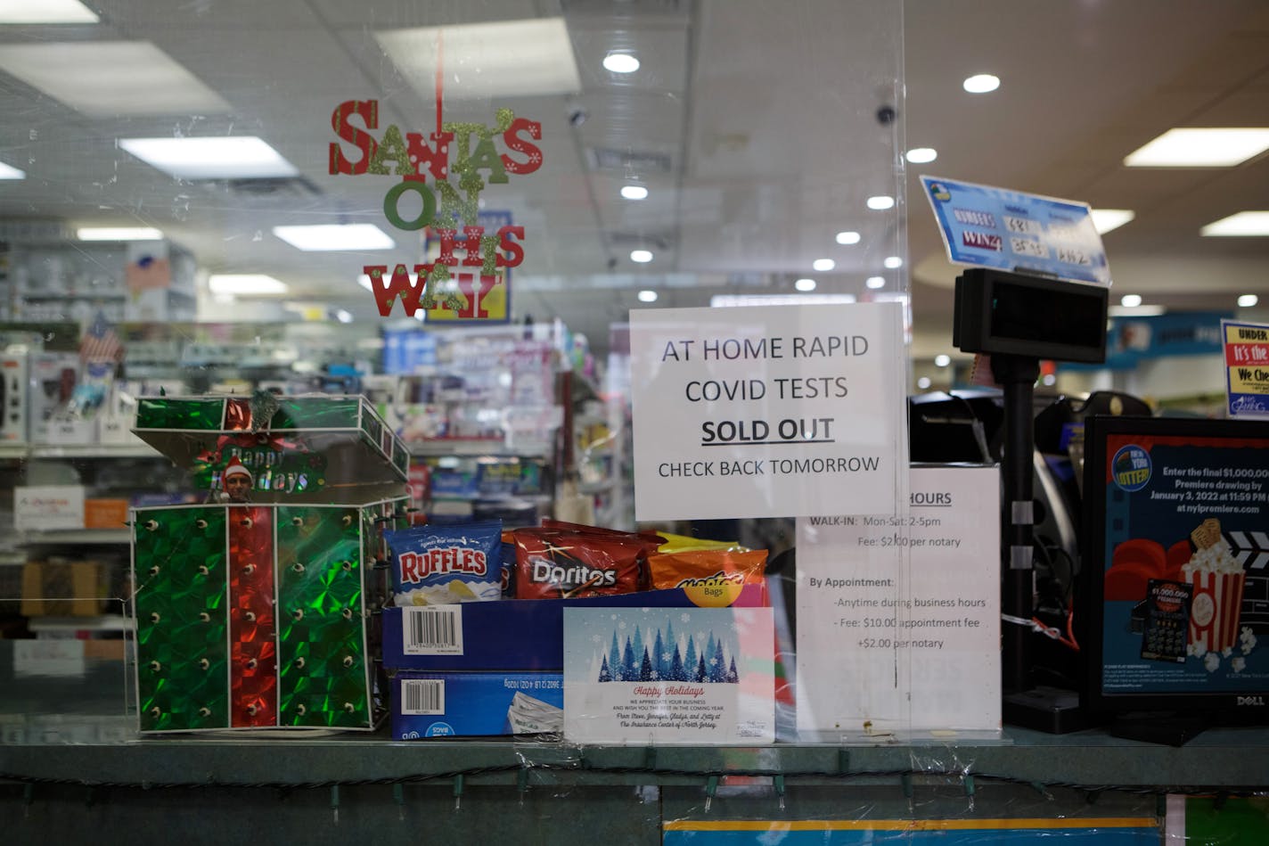 FILE — A sign in a pharmacy in the Park Slope neighborhood of Brooklyn on Thursday morning Dec. 23, 2021, notes that home rapid tests for COVID-19 are sold out. President Biden's coronavirus response coordinator said Wednesday, Jan. 5, 2022 that, beginning next week, Americans struggling to get tested for the coronavirus will be able to have the cost of rapid at-home tests reimbursed by their insurers, but offered no specific promises about when free tests would be available. (Anna Watts/The New York Times)