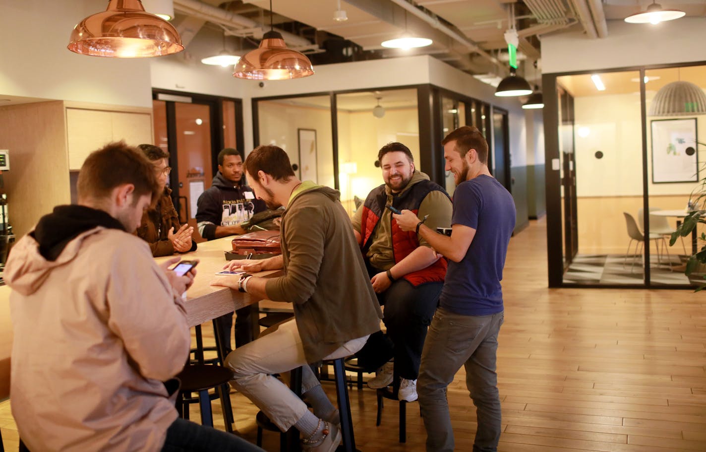 Twin Cities Startup Week starts Oct. 6. Shown is a gathering during last year's event at the WeWork office of workers from out of town that the startup organizers were courting. (DAVID JOLES/Star Tribune)