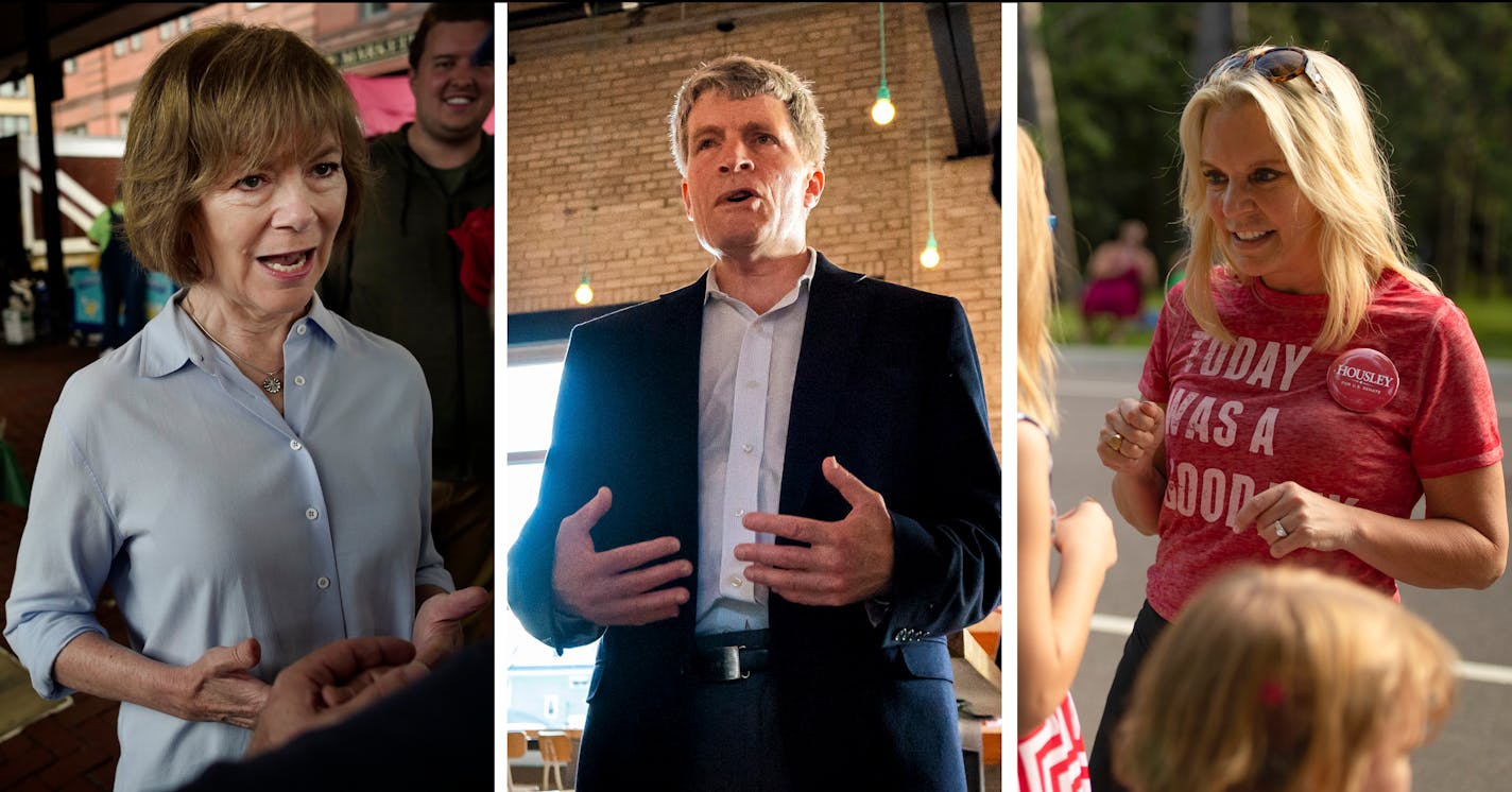 From left, Sen. Tina Smith, Richard Painter, state Sen. Karin Housley