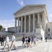 Visitors line up to enter the Supreme Court in Washington, Tuesday, Oct. 14, 2014, as it begins the second week of its new term. The landscape has cha