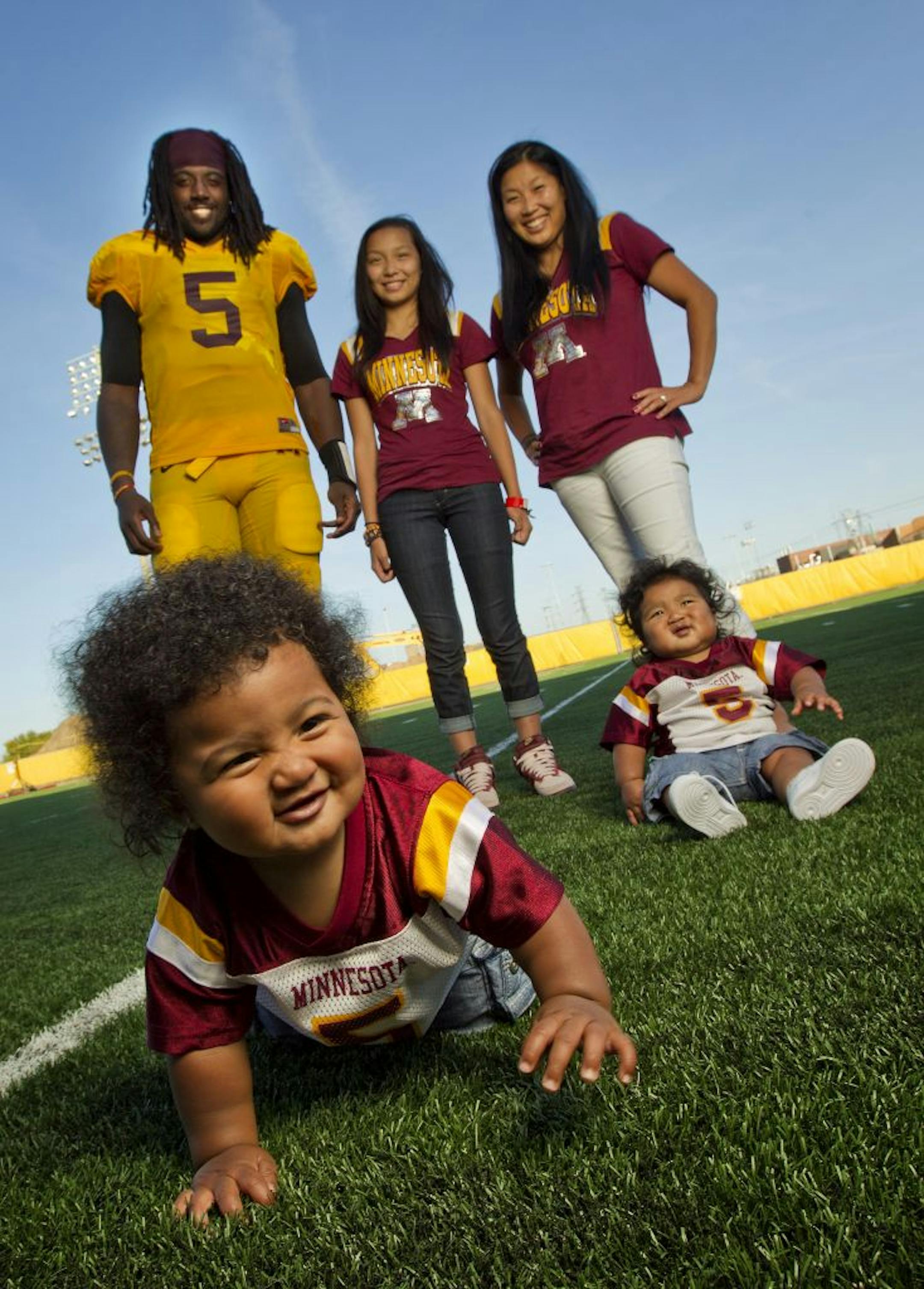 MarShawn Gray, (foreground) twin brother MarZell Gray, 9-months old, (Back row) University of Minnesota Gophers quarterback MarQueis Gray, Tessa Gray, 13, and fiancé Alley Behr. MarQueis is in the process of adopting Tessa. .