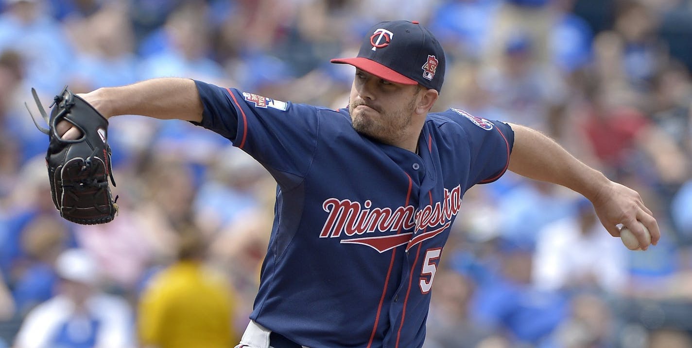 Minnesota Twins relief pitcher Brian Duensing (52) throws in the seventh inning against the Kansas City Royals at Kauffman Stadium in Kansas City, Sunday, April 20, 2014. The Twins defeated the Royals, 8-3.