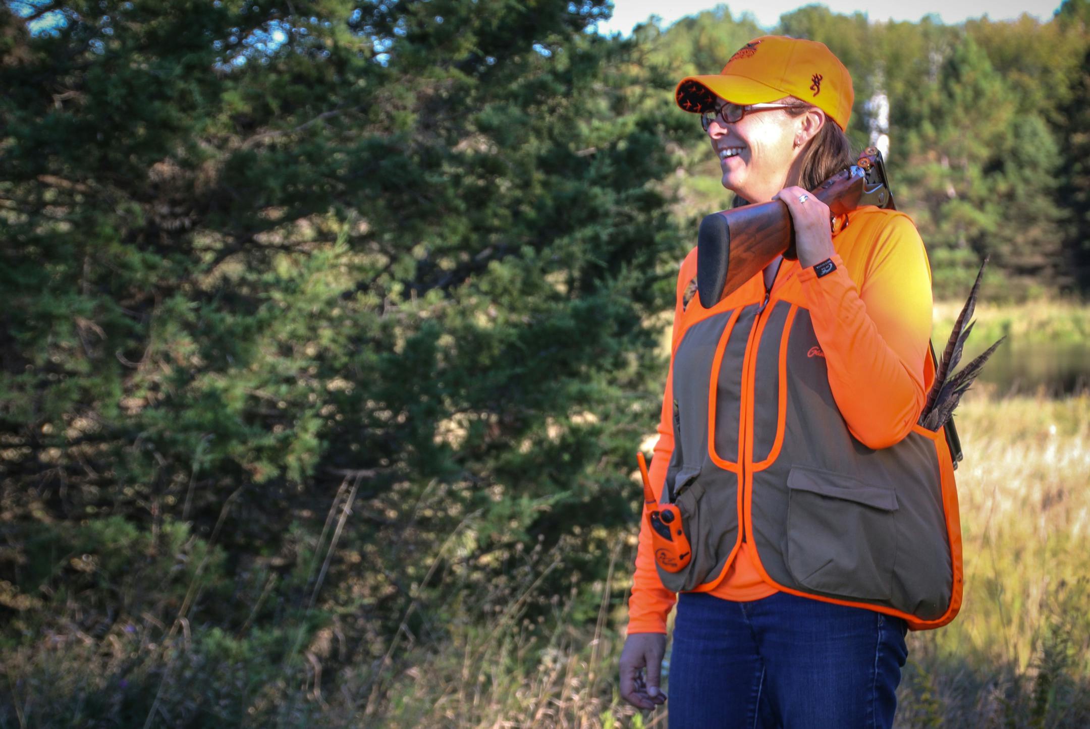 Julia Schrenkler of St.Paul learned to hunt as an adult, and especially enjoys working her dog Wren in praiurie grasses for pheasants or in the woods for grouse and woodcock.