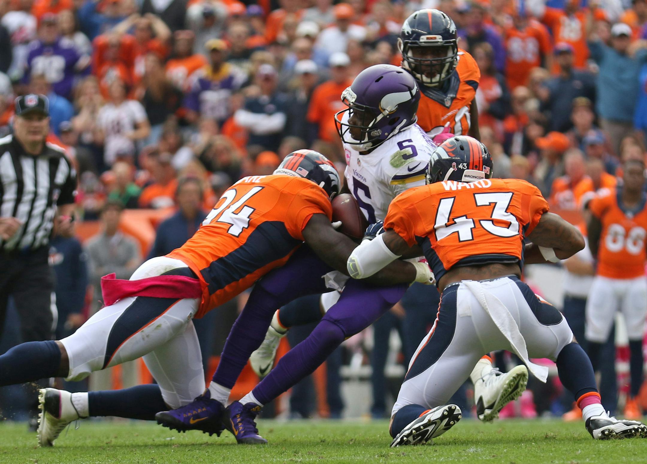 Vikings quarterback Teddy Bridgewater is sacked in the 1st half. ] Minnesota Vikings vs Denver Broncos, Sports Authority Field at Mile High Stadium. Brian.Peterson@startribune.com Denver, CO - 10/04/2015