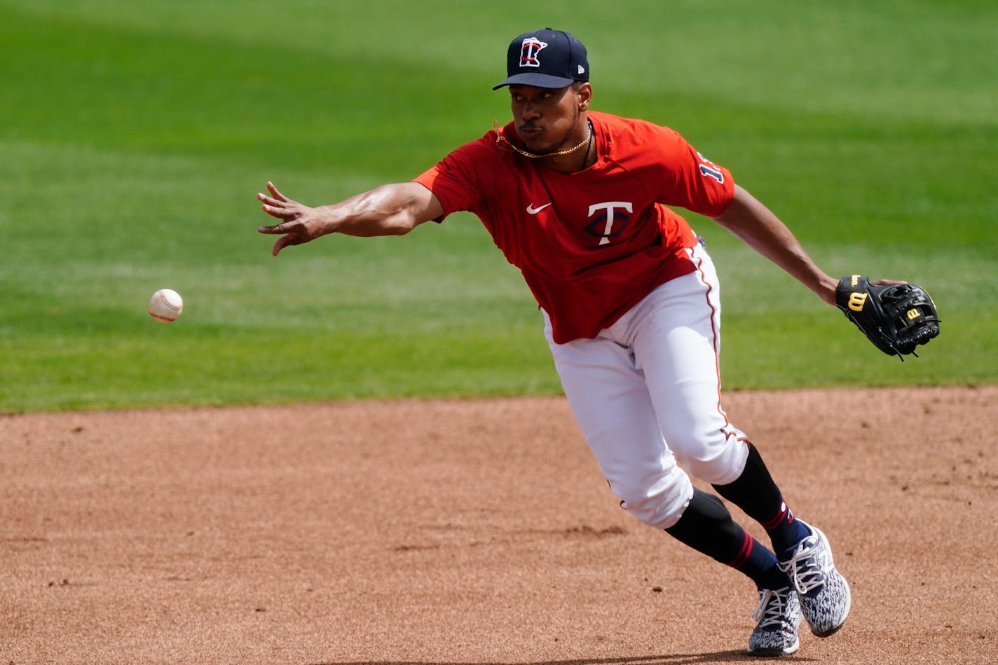 Minnesota Twins shortstop Jorge Polanco (11) practices before a spring training baseball game against the Boston Red Sox Thursday, March 11, 2021, in Fort Myers, Fla.. (AP Photo/John Bazemore)