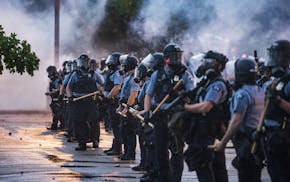 Most protesters were peaceful while a few started destroying police property. Peaceful protesters pleaded with those who resorted to violence to stop.