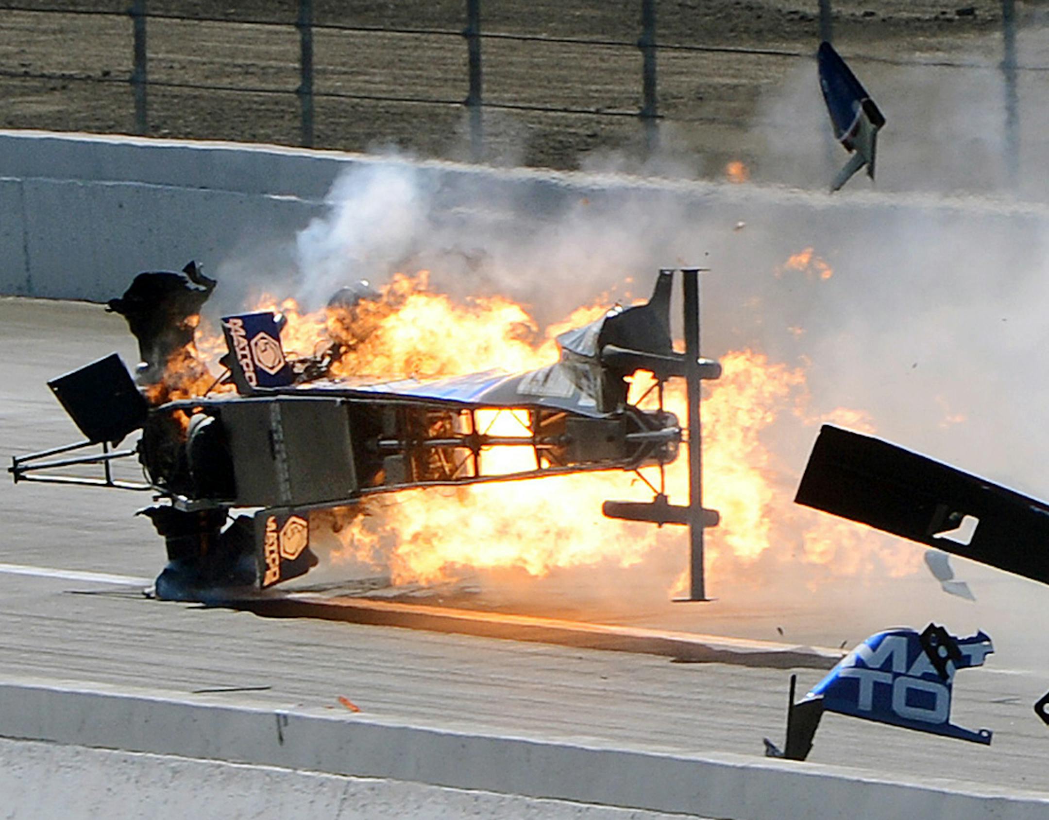 Top Fuel driver Antron Brown's dragster bursts into flames after crashing in the second round of eliminations at the NHRA Winternationals auto racing event, Sunday, Feb. 17, 2013, in Pomona, Calif. Brown walked away from the fiery crash with only minor injuries. (AP Photo/The Inland Valley Daily Bulletin, Will Lester) MANDATORY CREDIT; MAGS OUT ORG XMIT: CAONT202