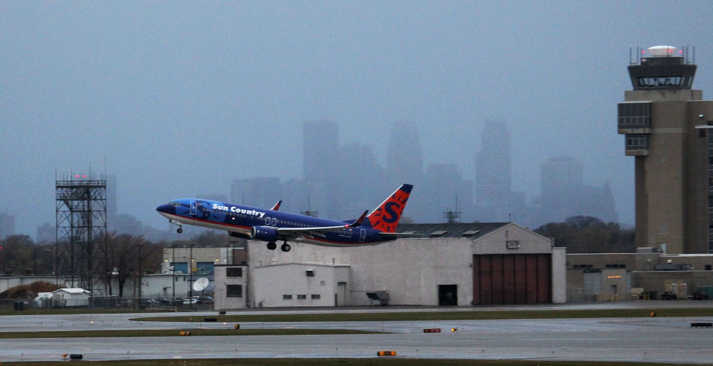 A Sun Country jet takes off from Minneapolis-St. Paul International Airport.