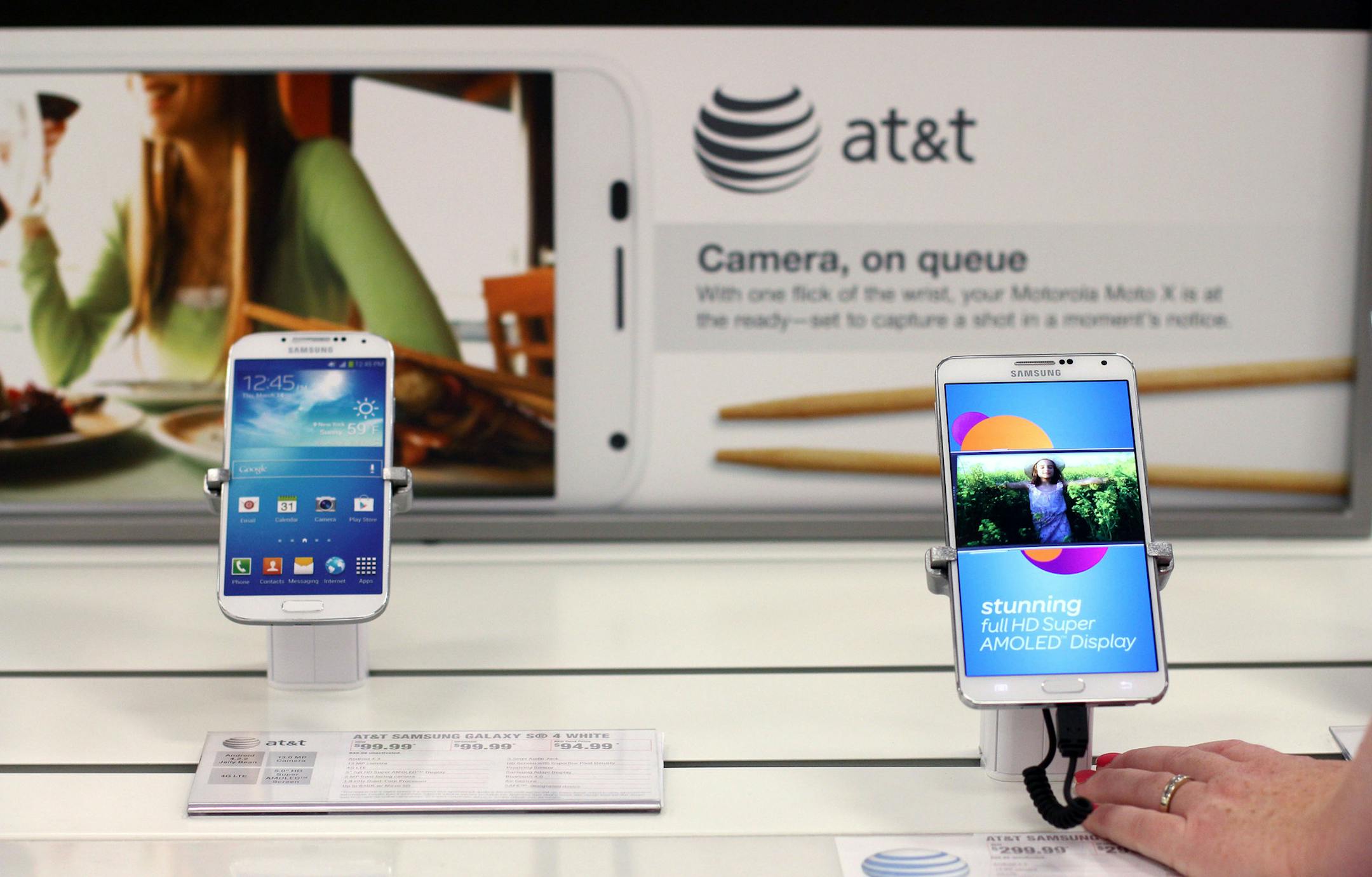 Target is testing out these sample cellphones, that are available to be held and played with, instead of packaged in a box. ] Target is testing out new features in it's New Brighton Blvd. store. MONICA HERNDON monica.herndon@startribune.com Minneapolis, MN 06/18/2014