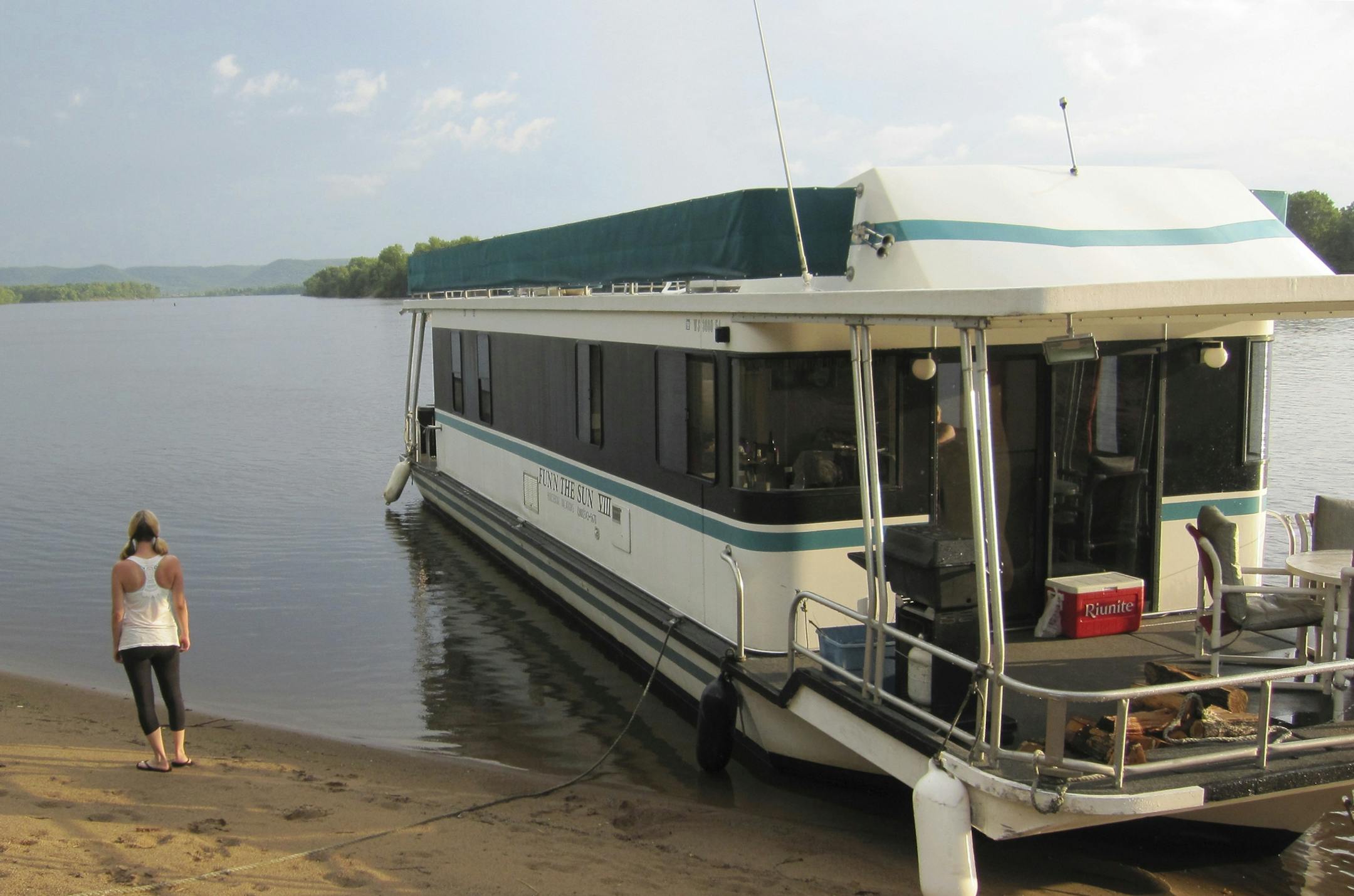 Watching the Mississippi River flow after a day on the houseboat.