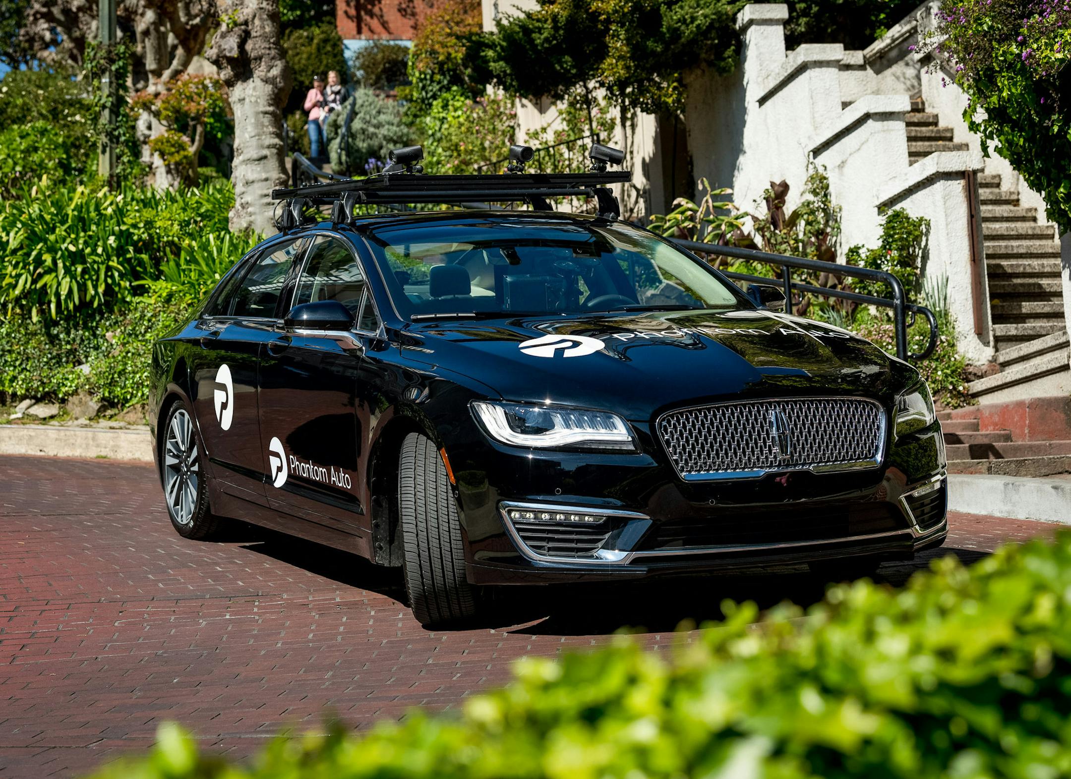 A California startup, Phantom Auto, is introducing driverless vehicles to San Francisco, San Jose, Sacramento and Mountain View, Calif. The drivers of these vehicles operate them remotely from Phantom's office in Mountain View, sometimes more than 100 miles away. The concept would assist autonomous vehicles in situations where the autonomous technology might struggle to navigate, such as road construction. (Karl Nielsen/Phantom Auto/TNS)