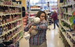 Breanna Buckhalton shops for groceries with her 4-month-old daughter Celina. ] Breanna Buckhalton was sexually abused as a child and was in the crimin