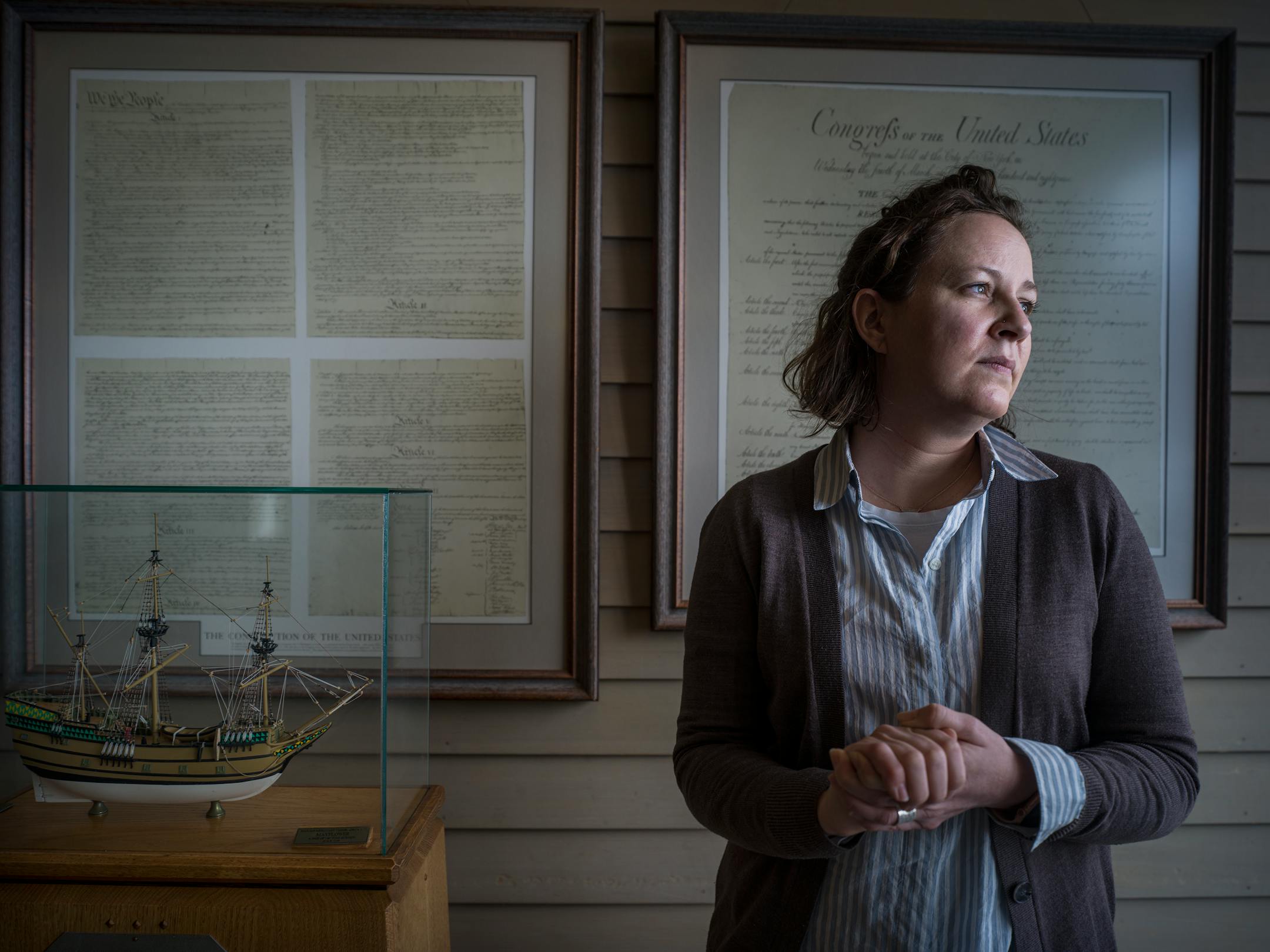 On March 17, 2021 Colonial Church of Edina, Pastor Sara Wilhelm Garbers posed in front of a model of the Mayflower and with supposedly a piece of timber from the original ship which reflects the church's Puritan roots. ] RICHARD TSONG-TAATARII • richard.tsong-taatarii@startribune.com