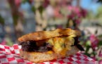 An upgrade on the usual breakfast sandwich from Animales Barbeque Co.: peppery, smoked pastrami, soft scrambled eggs and cheese on cheesy focaccia.