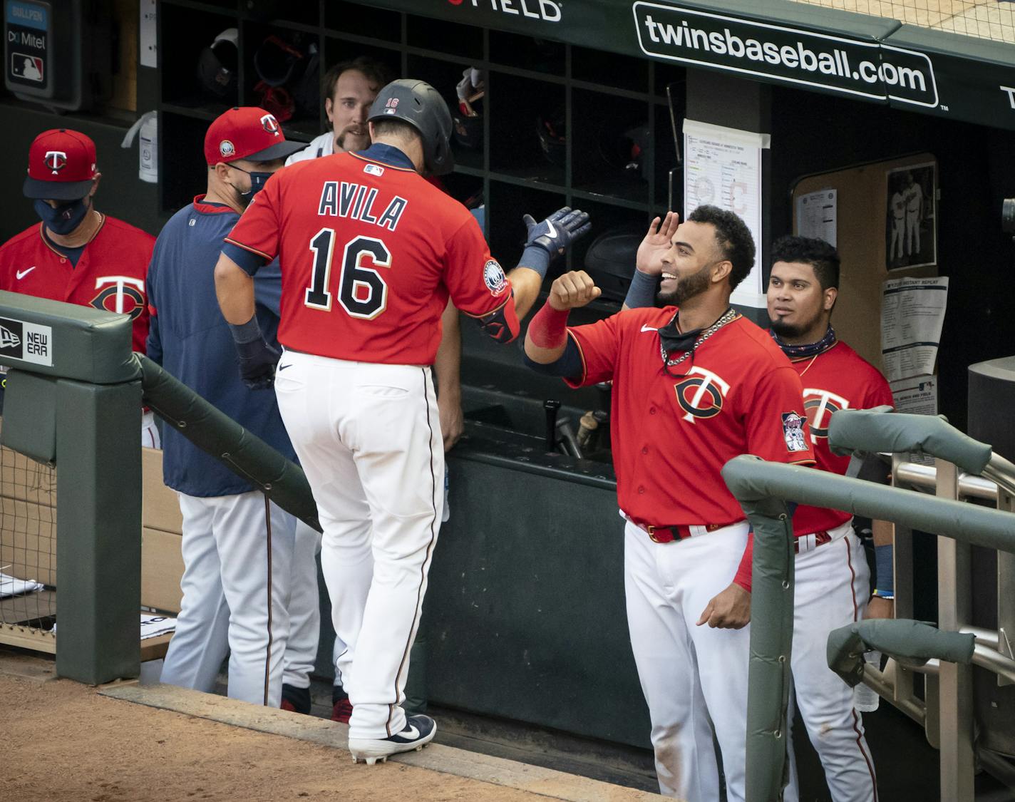 Minnesota Twins catcher Alex Avila (16) celebrated with the dugout after he hit a home run in the second inning. ] RENEE JONES SCHNEIDER renee.jones@startribune.com The Minnesota Twins played the Cleveland Indians at Target Field in Minneapolis, Minn, Minn., on Friday, July 31, 2020.