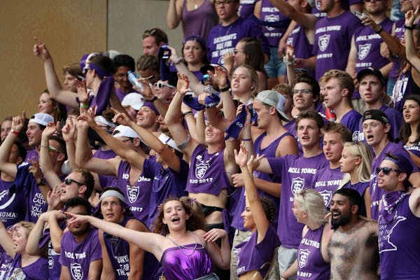 University of St. Thomas fans cheered from the stands late in the second half of a football game last season.
