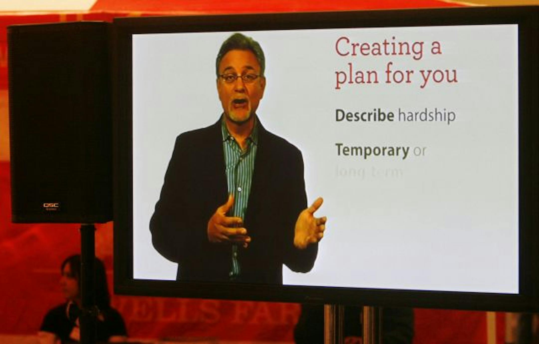 Large TVs alternated between self-help instructions and music videos in lounge areas of the Wells Fargo & Co. workshop Wednesday at the RiverCentre in St. Paul.