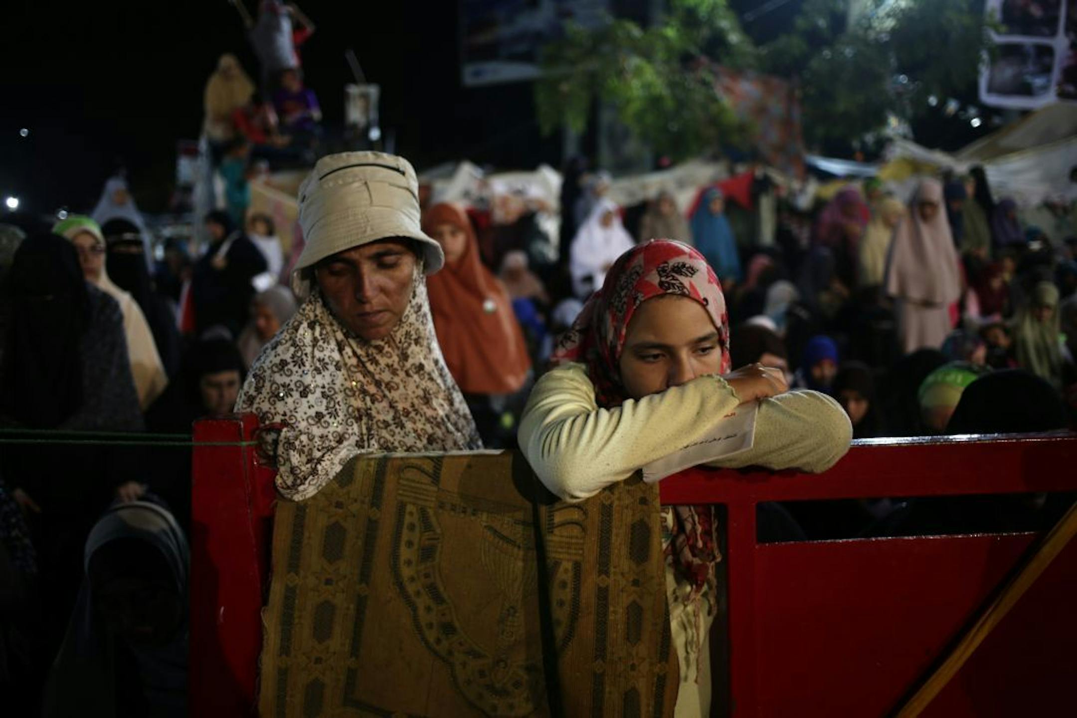 Supporters of Egypt's ousted President Mohammed Morsi pray at Rabaah al-Adawiya mosque, where supporters of Egypt's ousted President Mohammed Morsi have installed a camp and hold daily rallies at Nasr City, in Cairo, Egypt, Wednesday, July 31, 2013. Egypt's military-backed government has ordered the police to break up the sit-in protests by supporters of ousted President Mohammed Morsi, saying they pose an "unacceptable threat" to national security. Information Minister Dorreya Sharaf el-Din sai