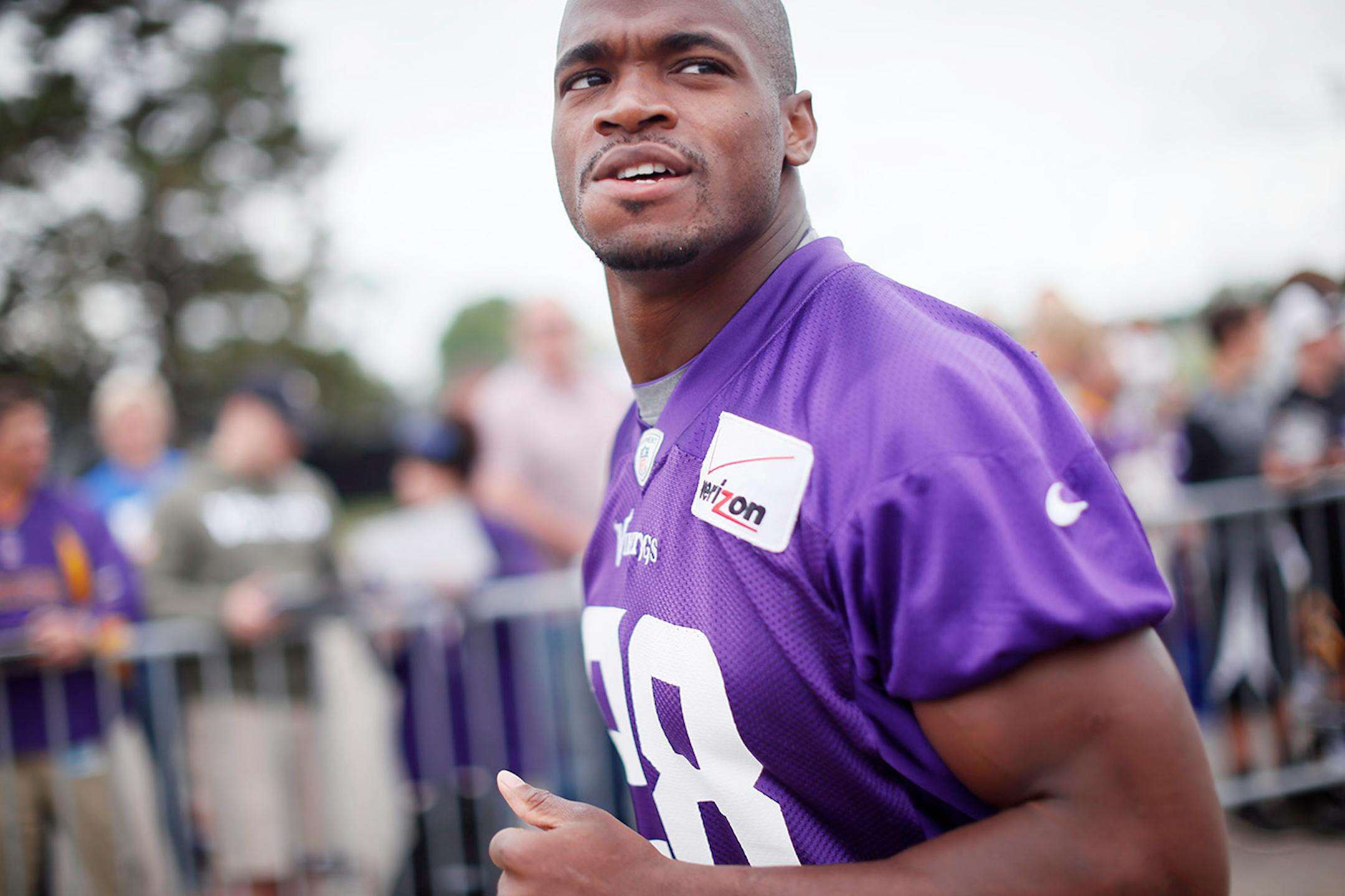 Adrian Peterson arrived at the practice field during NFL camp at Minnesota State University, Mankato Monday July 28, 2014.