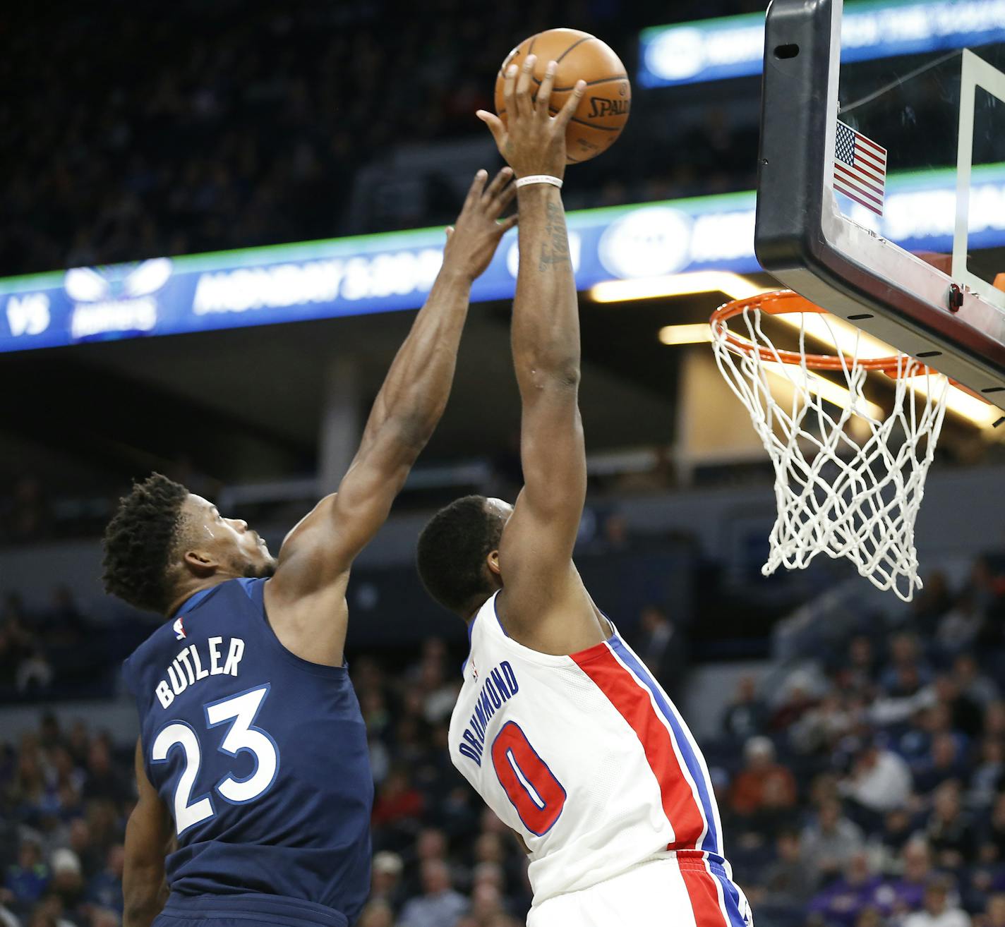 Detroit Pistons center Andre Drummond (0) shoots the ball while Minnesota Timberwolves guard Jimmy Butler (23) defends during the second half. ] LEILA NAVIDI &#xef; leila.navidi@startribune.com BACKGROUND INFORMATION: The Minnesota Timberwolves play against the Detroit Pistons at Target Center in Minneapolis on Sunday, November 19, 2017. The Detroit Pistons won 100-97.