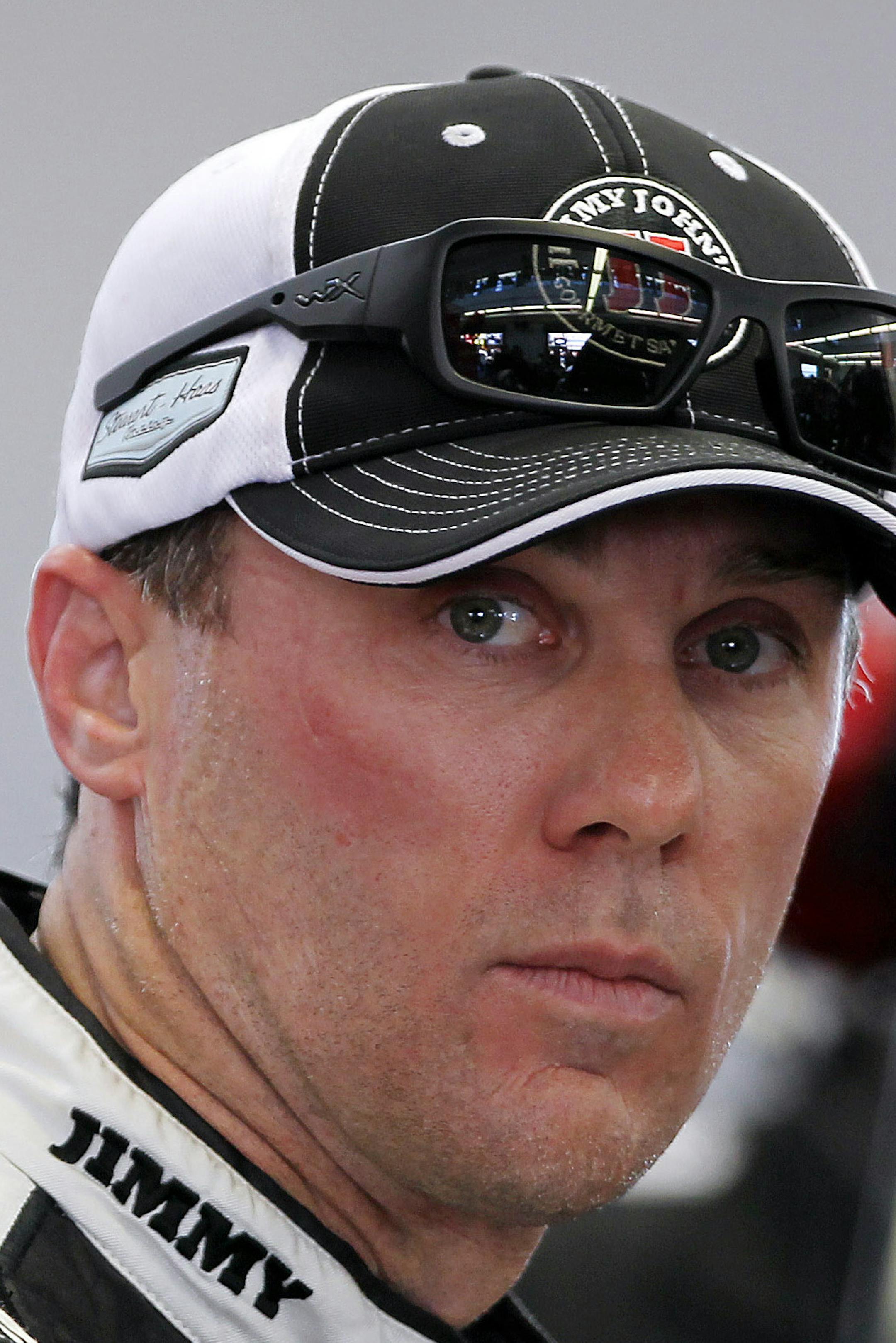 Kevin Harvick works in the garage during NASCAR Sprint Cup auto racing practice on Friday, March 7, 2014, in Las Vegas. (AP Photo/Isaac Brekken)