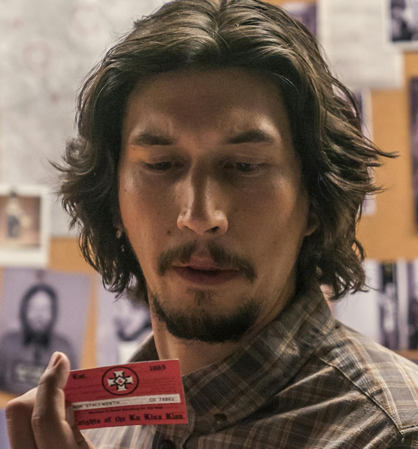 This image released by Focus Features shows Adam Driver, left, and John David Washington in a scene from "BlacKkKlansman." The cast was nominated for a SAG Award for best ensemble. The SAG Awards will be held Jan. 27 and broadcast live by TNT and TBS. This year's show will honor Alan Alda with the Screen Actors Guild Life Achievement Award. (David Lee/Focus Features via AP)