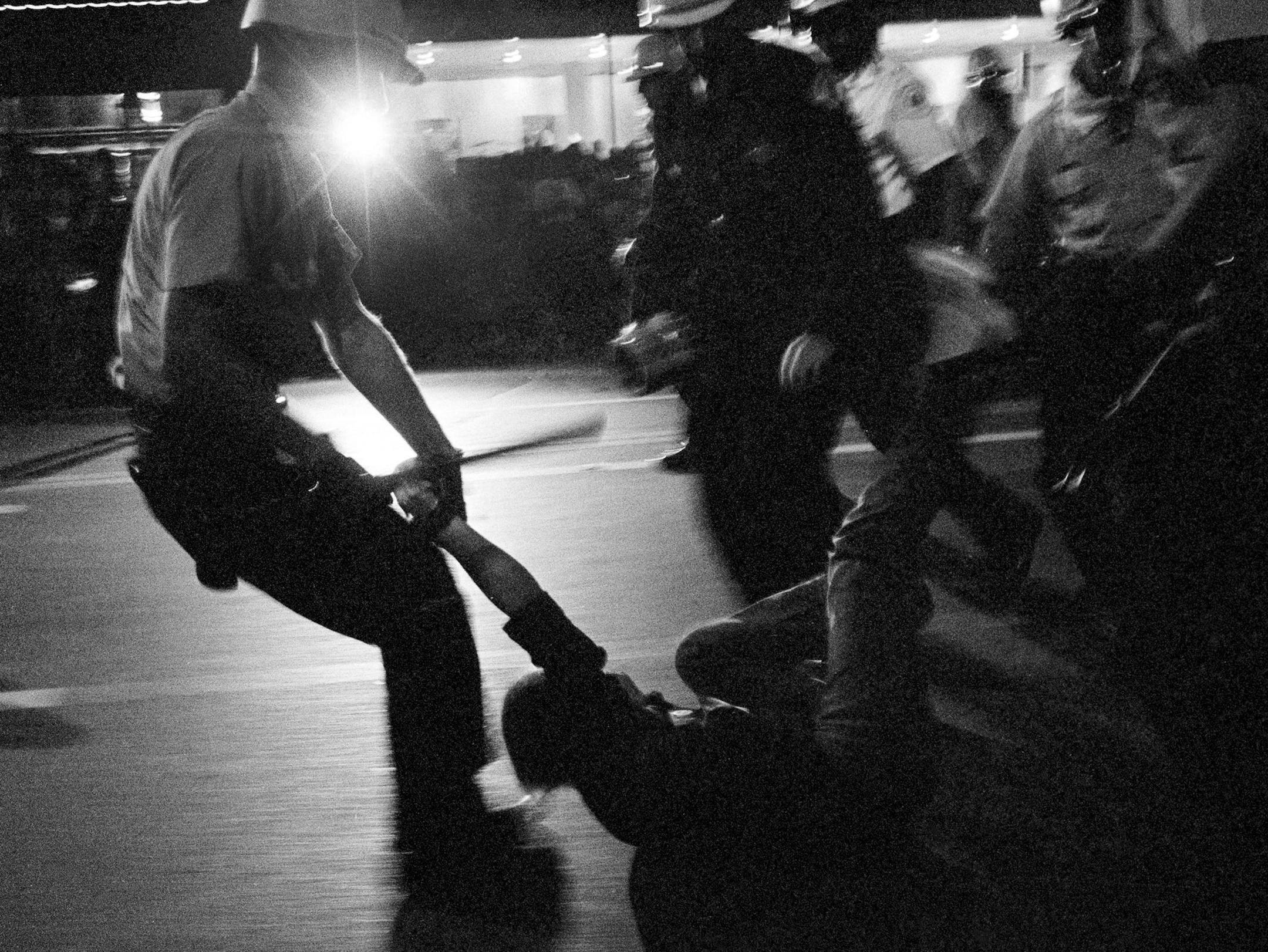FILE-- Police officers drag a protester during a demonstration outside the Democratic National Convention in Chicago, Aug. 29, 1968. Mass demonstrations have occurred at nearly every modern political convention. Cleveland and Philadelphia are preparing for the possibility that anger may spill into the streets during the Republican and Democratic conventions of 2016. (Barton Silverman/The New York Times)